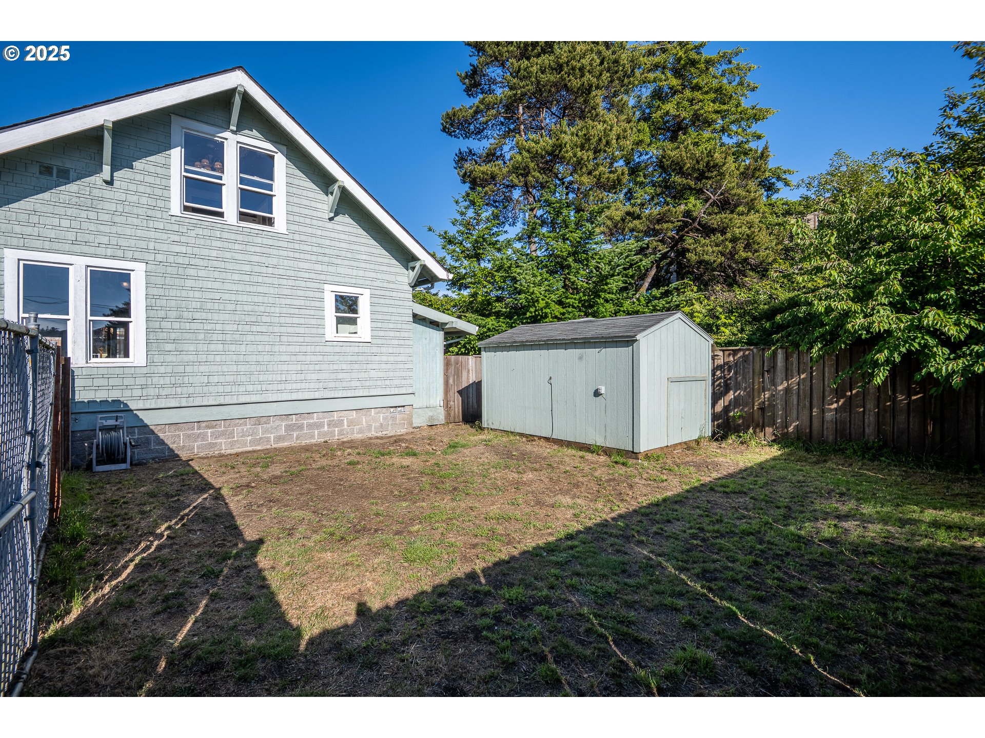 289 Harbor Street Florence, OR 97439 - Photo 41 of 47 a house view with a backyard space