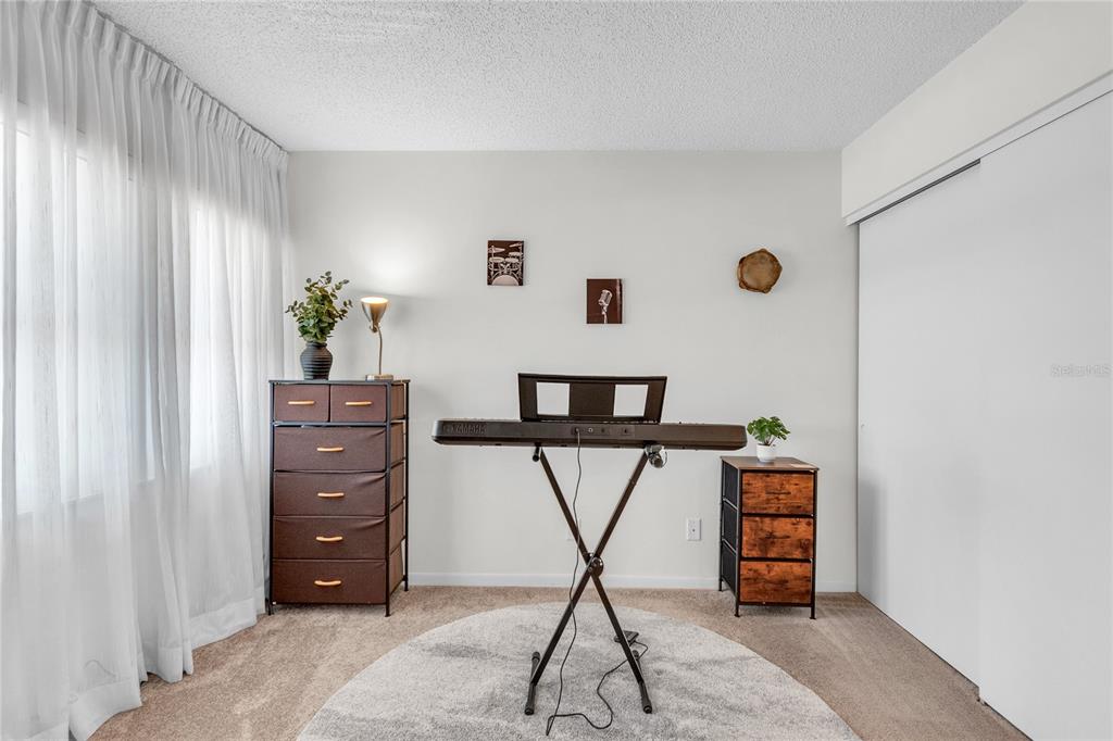 12200 Vonn Road, Unit 2206 Largo, FL 33774 - Photo 44 of 60 a living room with furniture and window