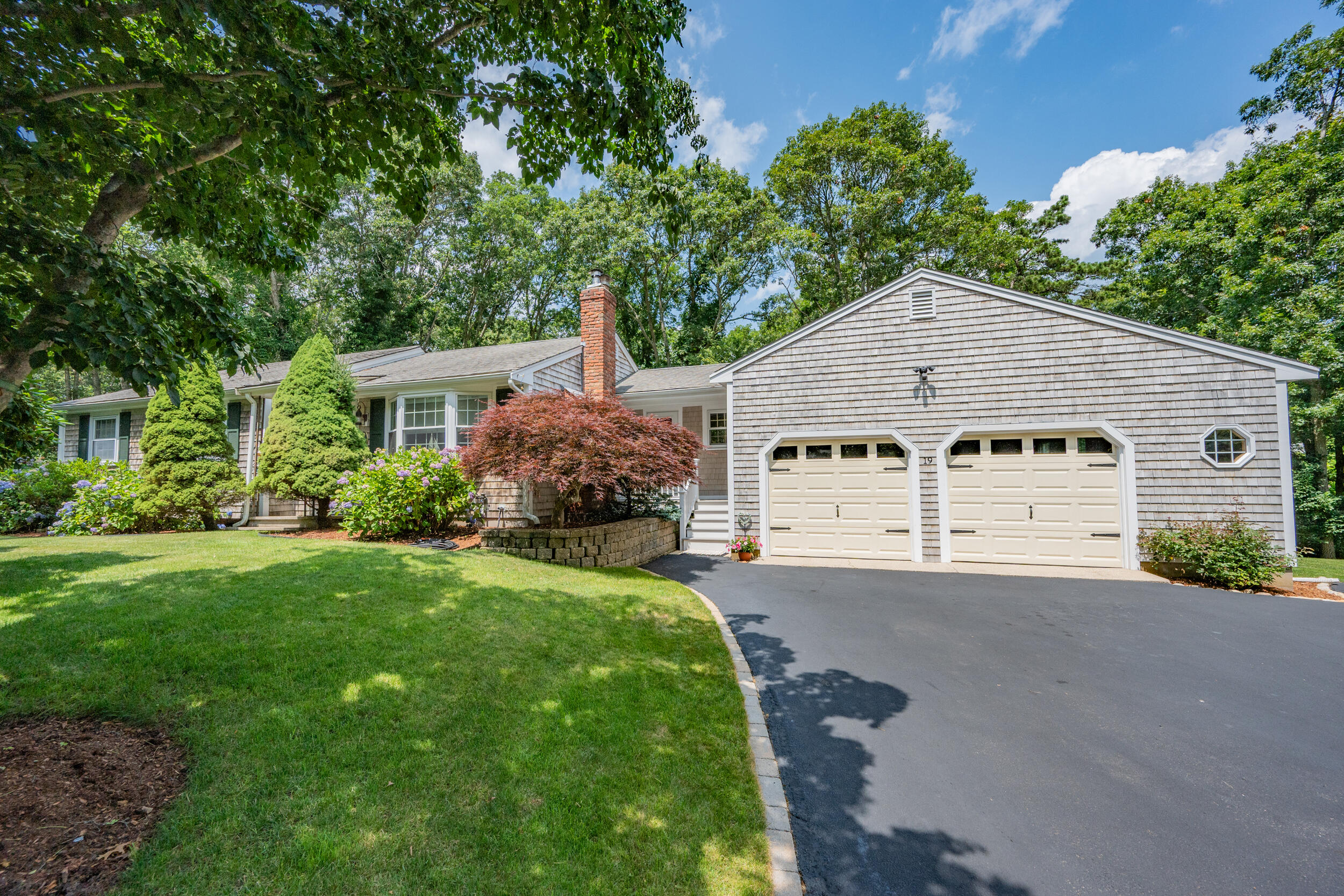 19 Shagbark Road Forestdale, MA 02644 - Photo 1 of 44 a house view with a garden space
