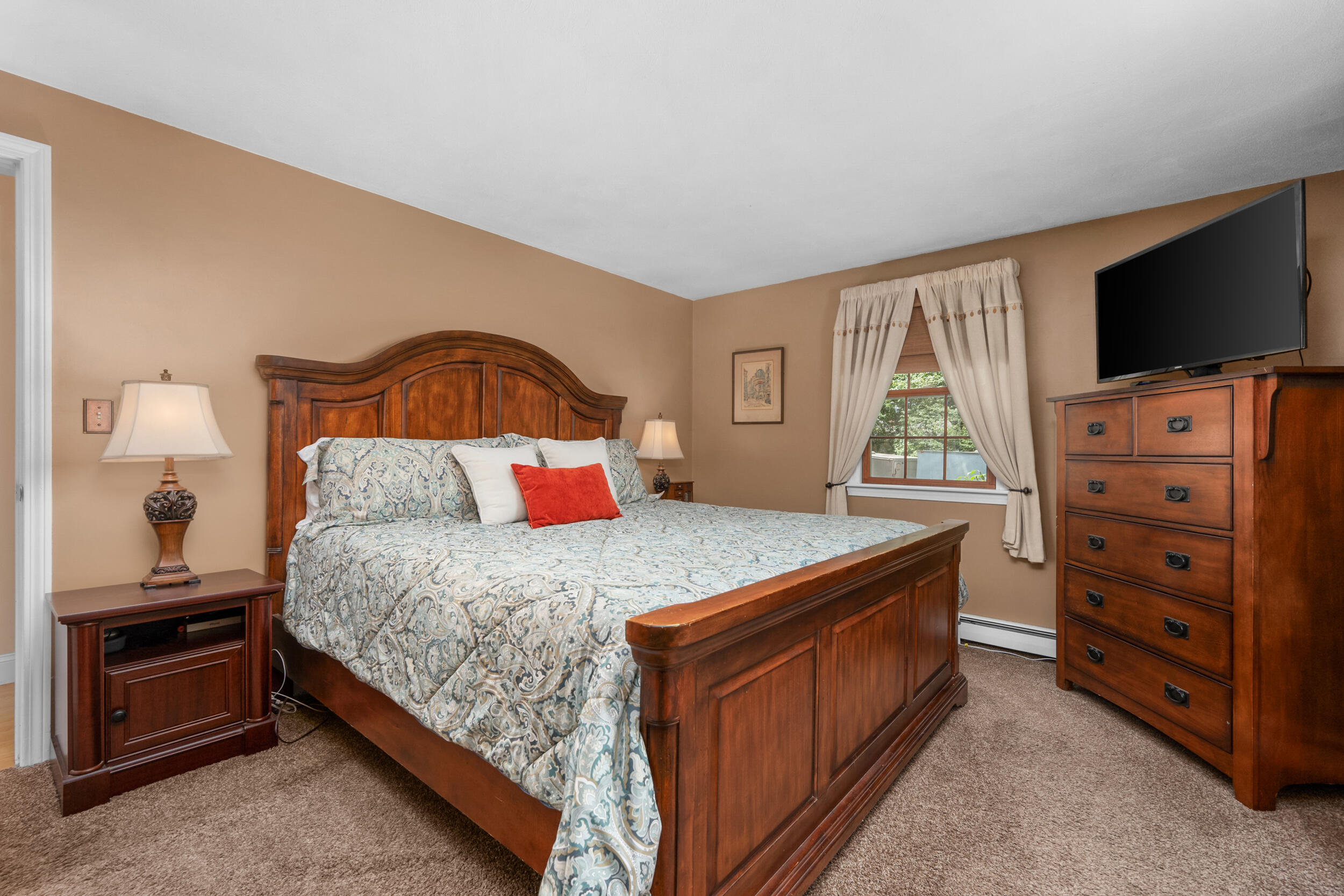 19 Shagbark Road Forestdale, MA 02644 - Photo 19 of 44 a bedroom with a bed and a flat screen tv