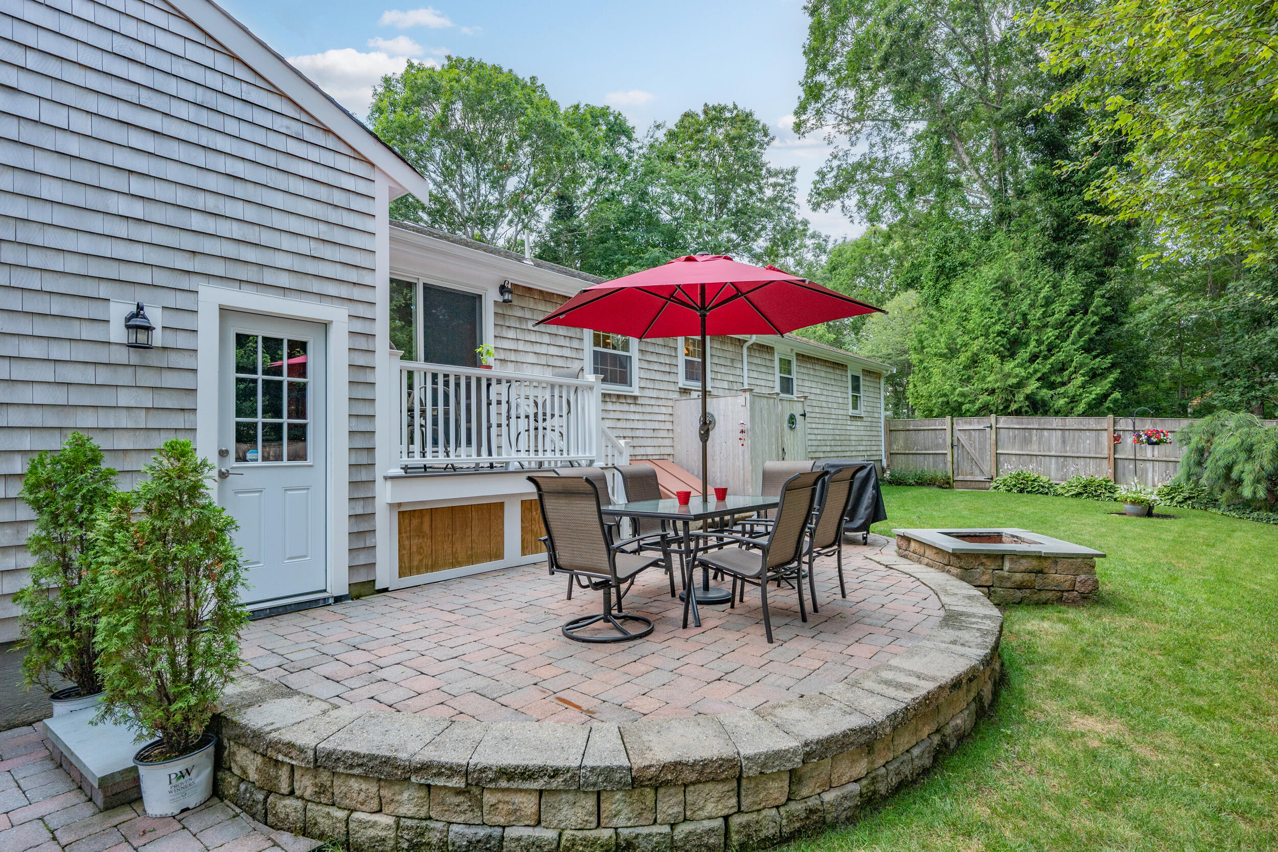 19 Shagbark Road Forestdale, MA 02644 - Photo 2 of 44 a view of a house with backyard sitting area and furniture