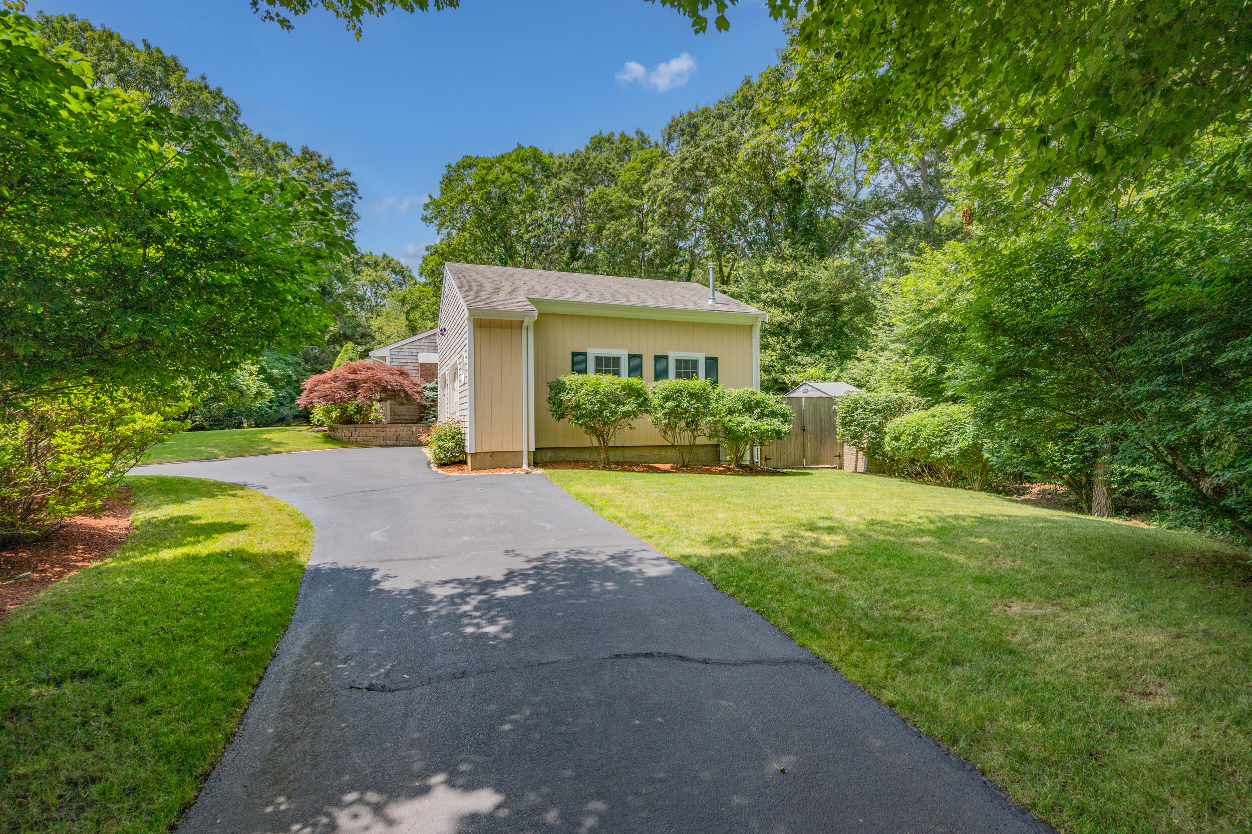 19 Shagbark Road Forestdale, MA 02644 - Photo 28 of 44 a front view of a house with a yard and garage
