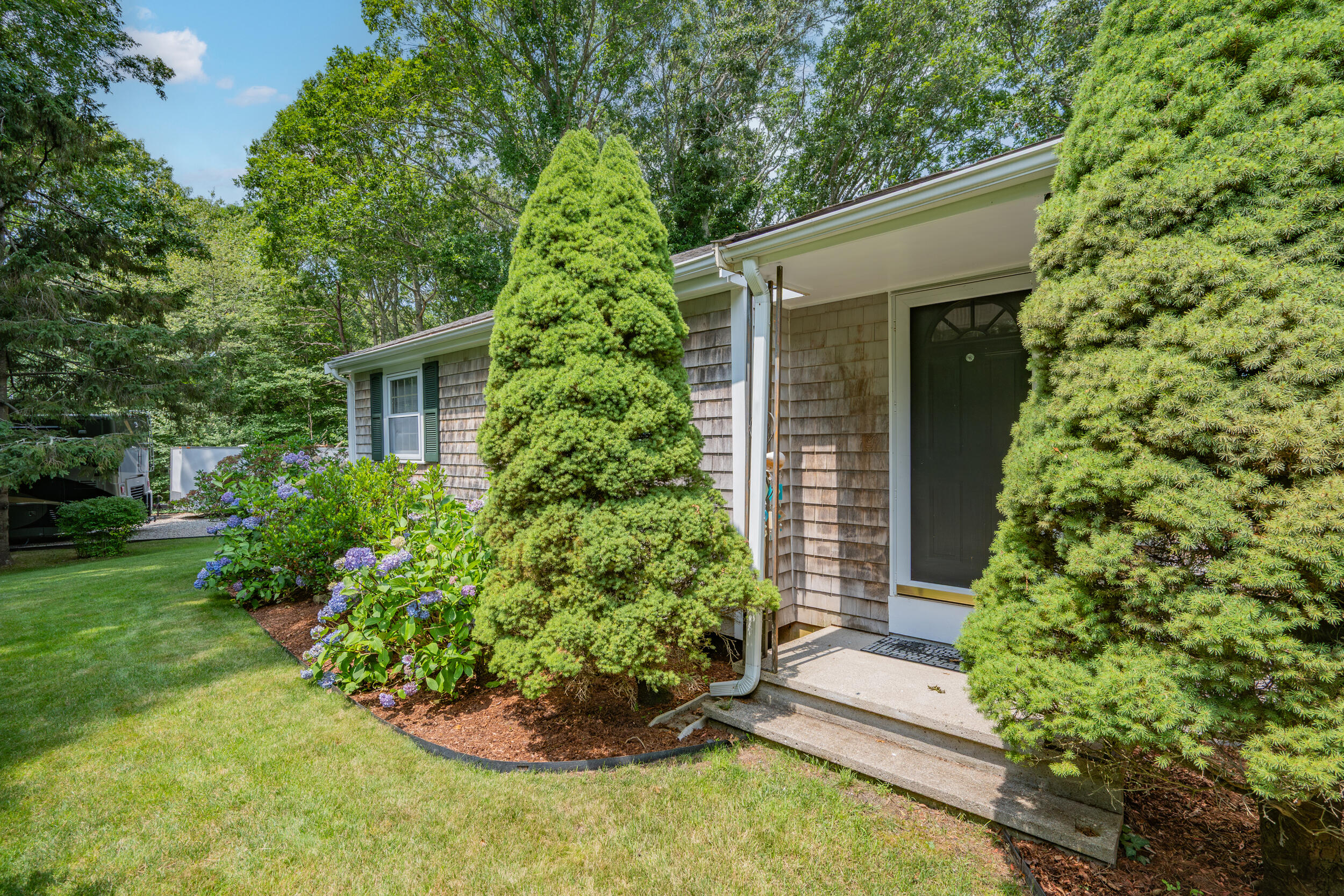 19 Shagbark Road Forestdale, MA 02644 - Photo 29 of 44 a front view of a house with a yard