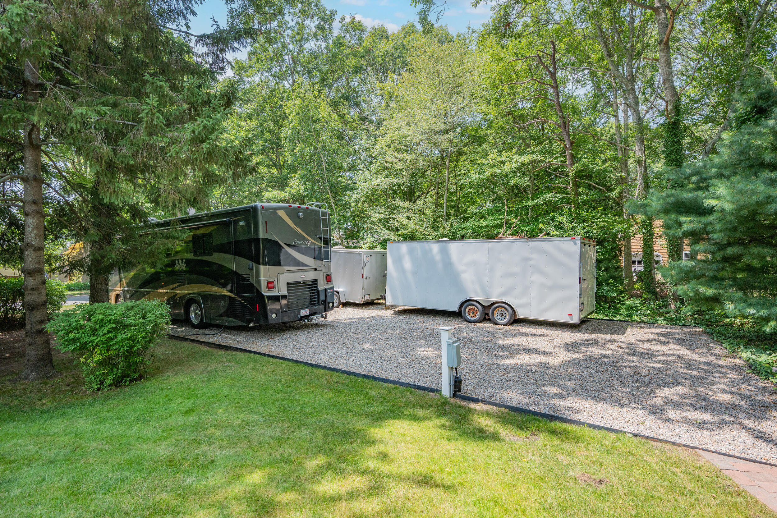 19 Shagbark Road Forestdale, MA 02644 - Photo 40 of 44 a view of a backyard with parked area