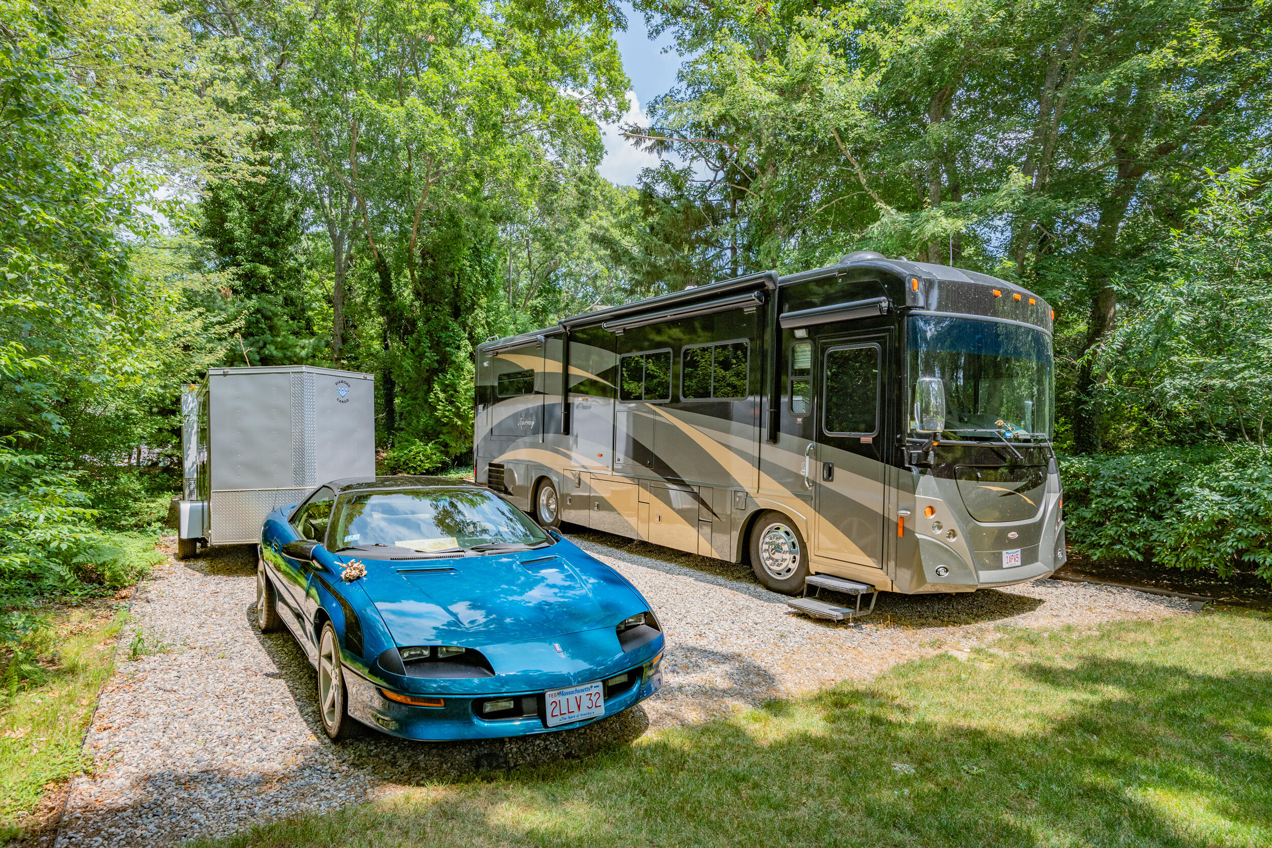 19 Shagbark Road Forestdale, MA 02644 - Photo 41 of 44 a car parked in front of a house
