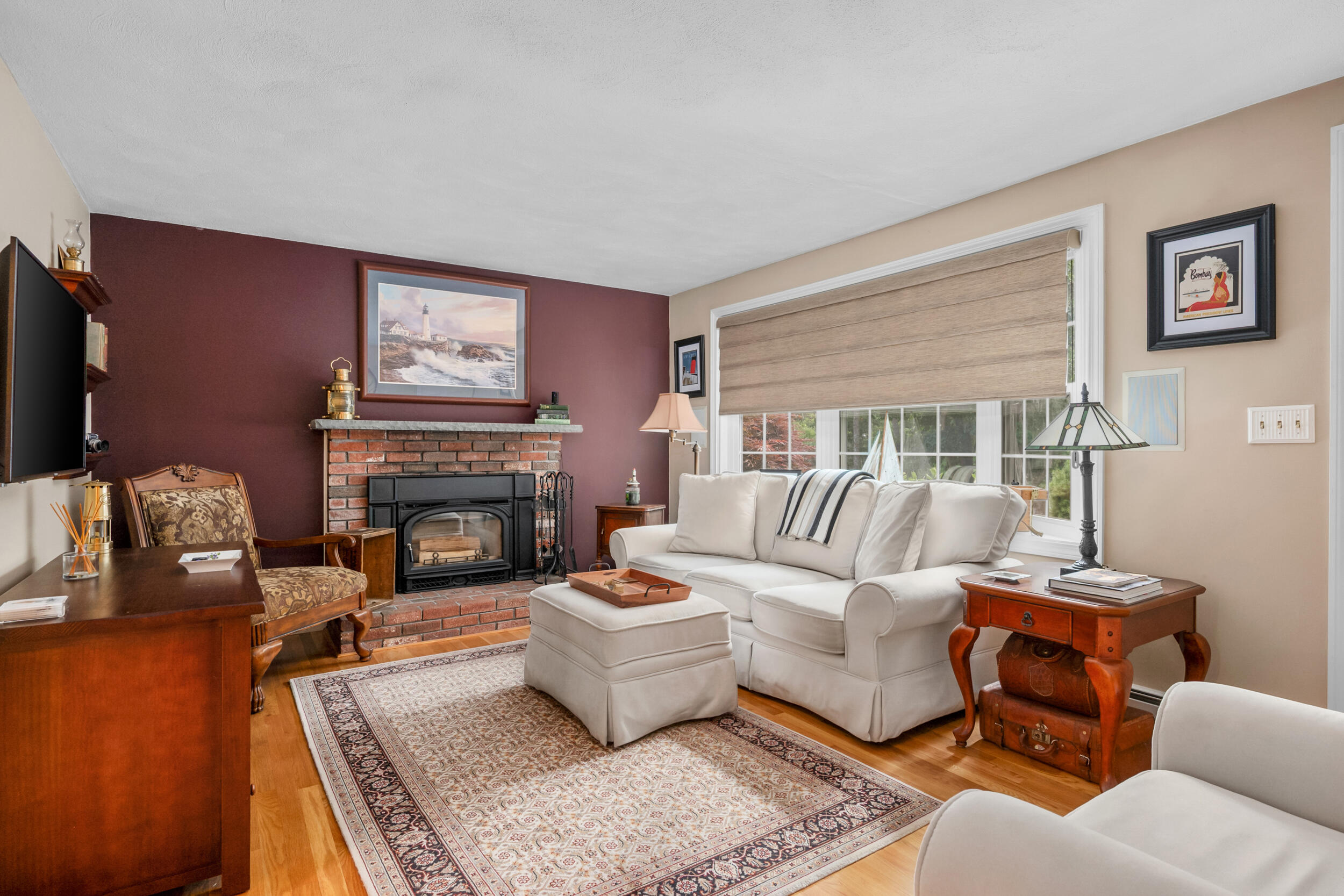 19 Shagbark Road Forestdale, MA 02644 - Photo 7 of 44 a living room with furniture a fireplace and a large window