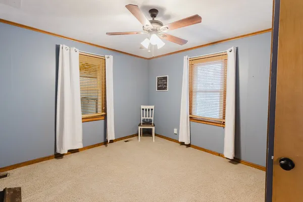 a view of a room with a large window