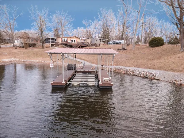 a view of a lake with a car parked