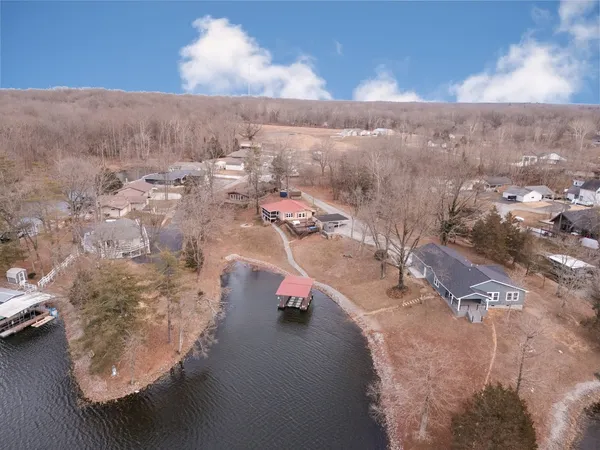 a front view of a house with parking space