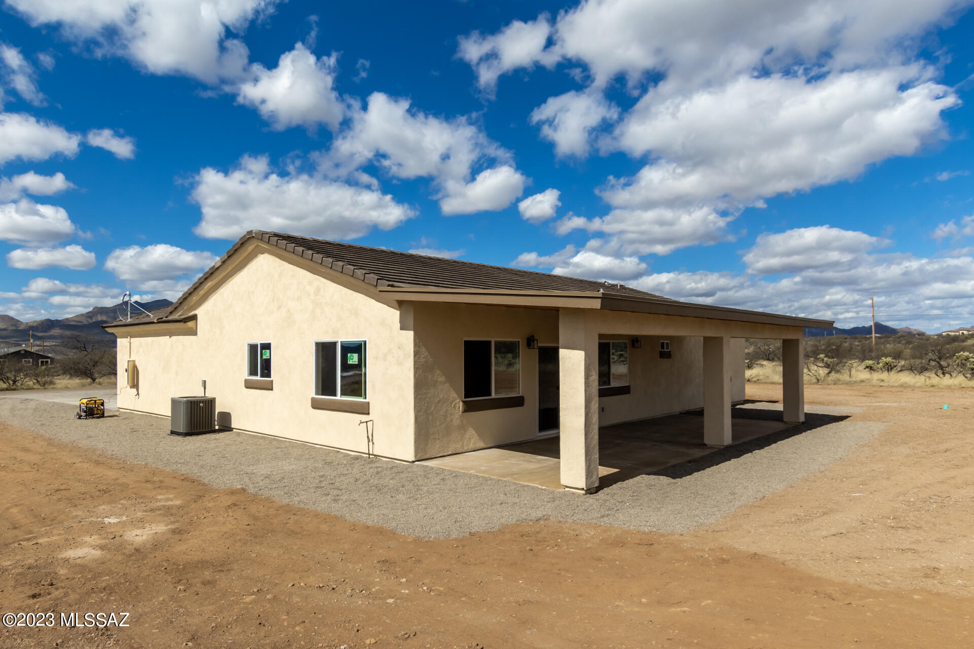 1795 Escobedo Court Rio Rico, AZ 85648 - Photo 27 of 30 a view of a house with a yard
