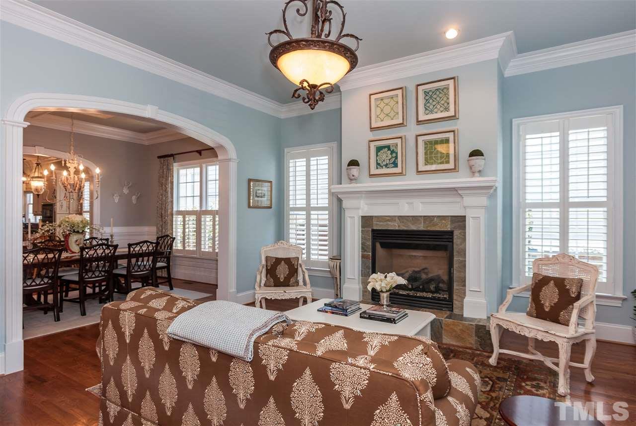 3105 Raymond Street Raleigh, NC 27607 - Photo 3 of 22 a view of a livingroom with furniture and a fireplace