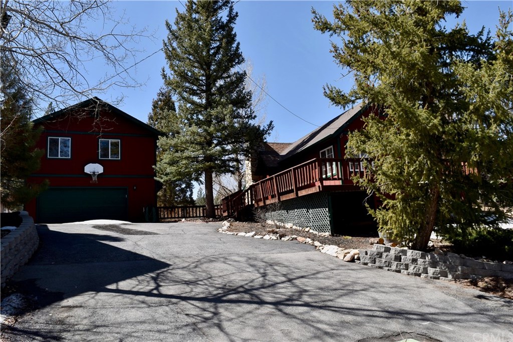 Walk to the village shops, restaurants, National Forest hiking trails, and country store from this 2003 remodeled centrally located, well-maintained Big Bear Lake property!