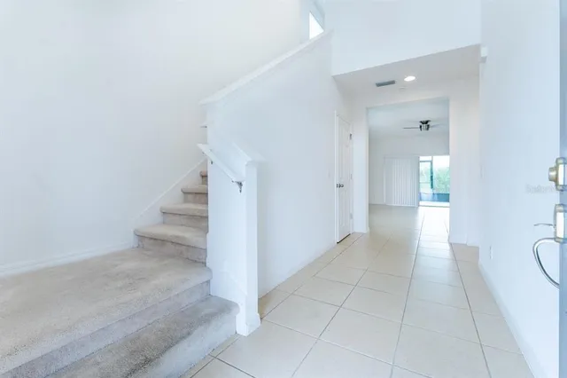 wooden floor in a room with a bathroom
