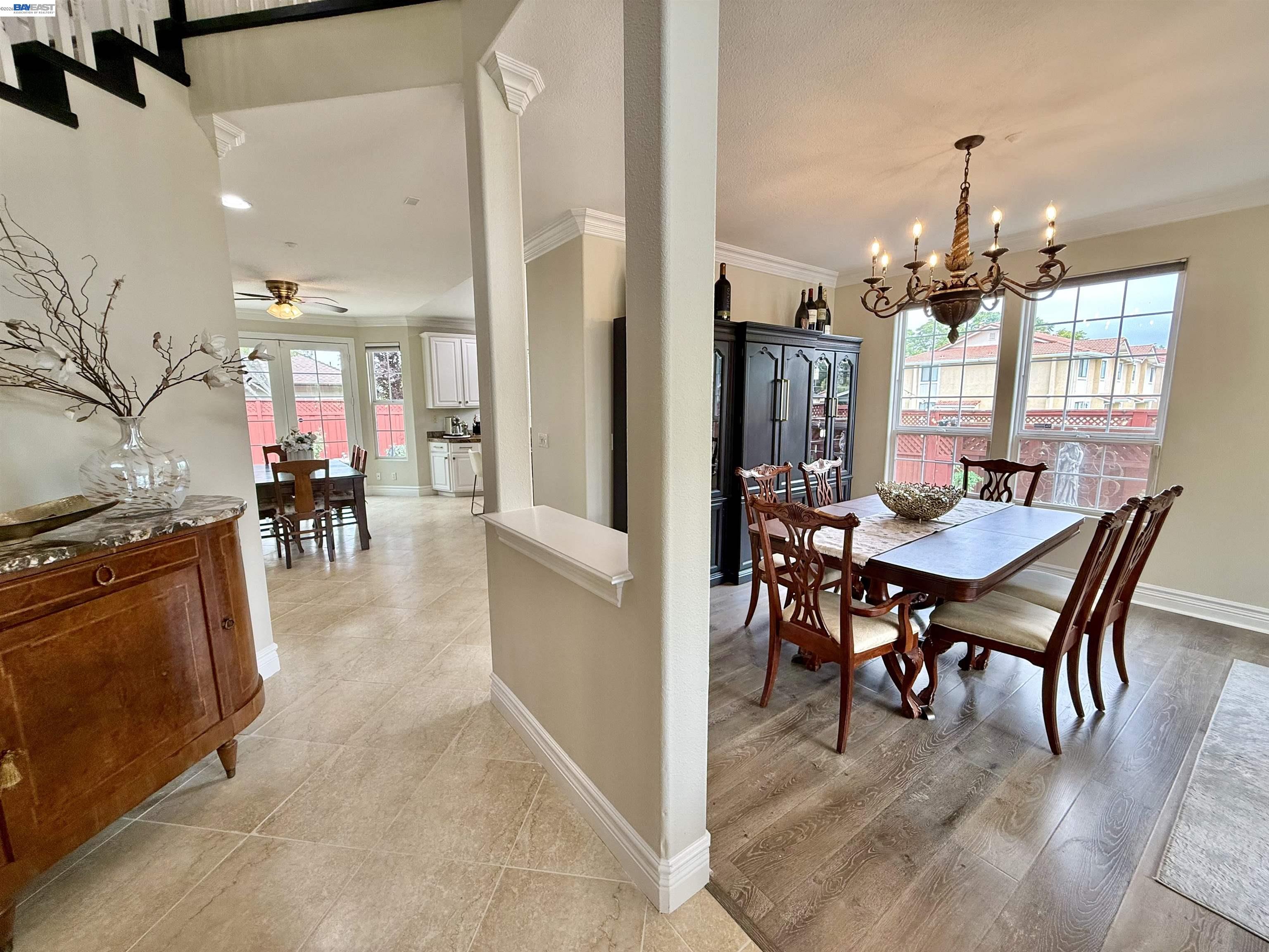 1284 Riesling Circle Livermore, CA 94550 - Photo 16 of 79 a view of a dining room and livingroom with furniture wooden floor a chandelier