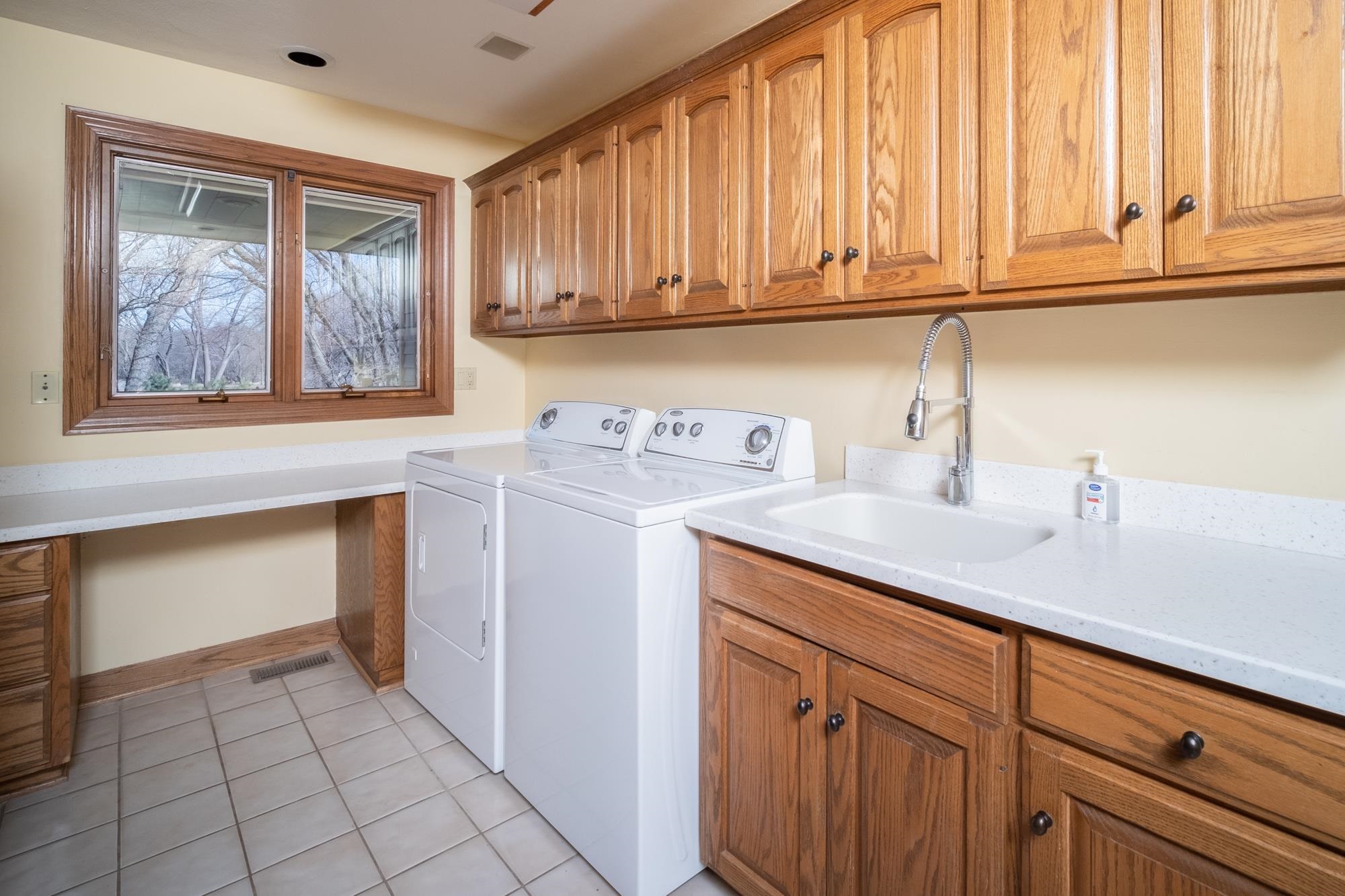 9805 Rivers Bend Drive Roscoe, IL 61073 - Photo 14 of 49 a view of a kitchen with sink and cabinets