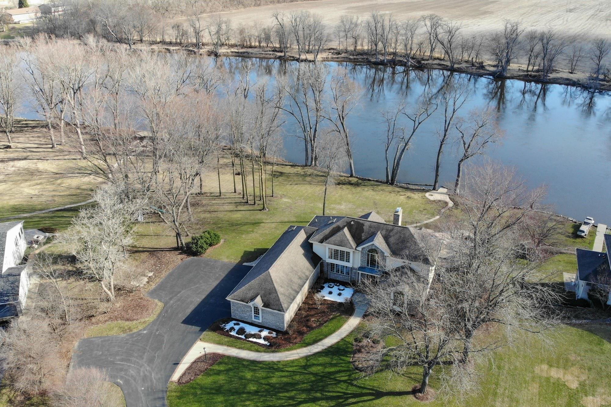 9805 Rivers Bend Drive Roscoe, IL 61073 - Photo 2 of 49 a view of swimming pool with a yard