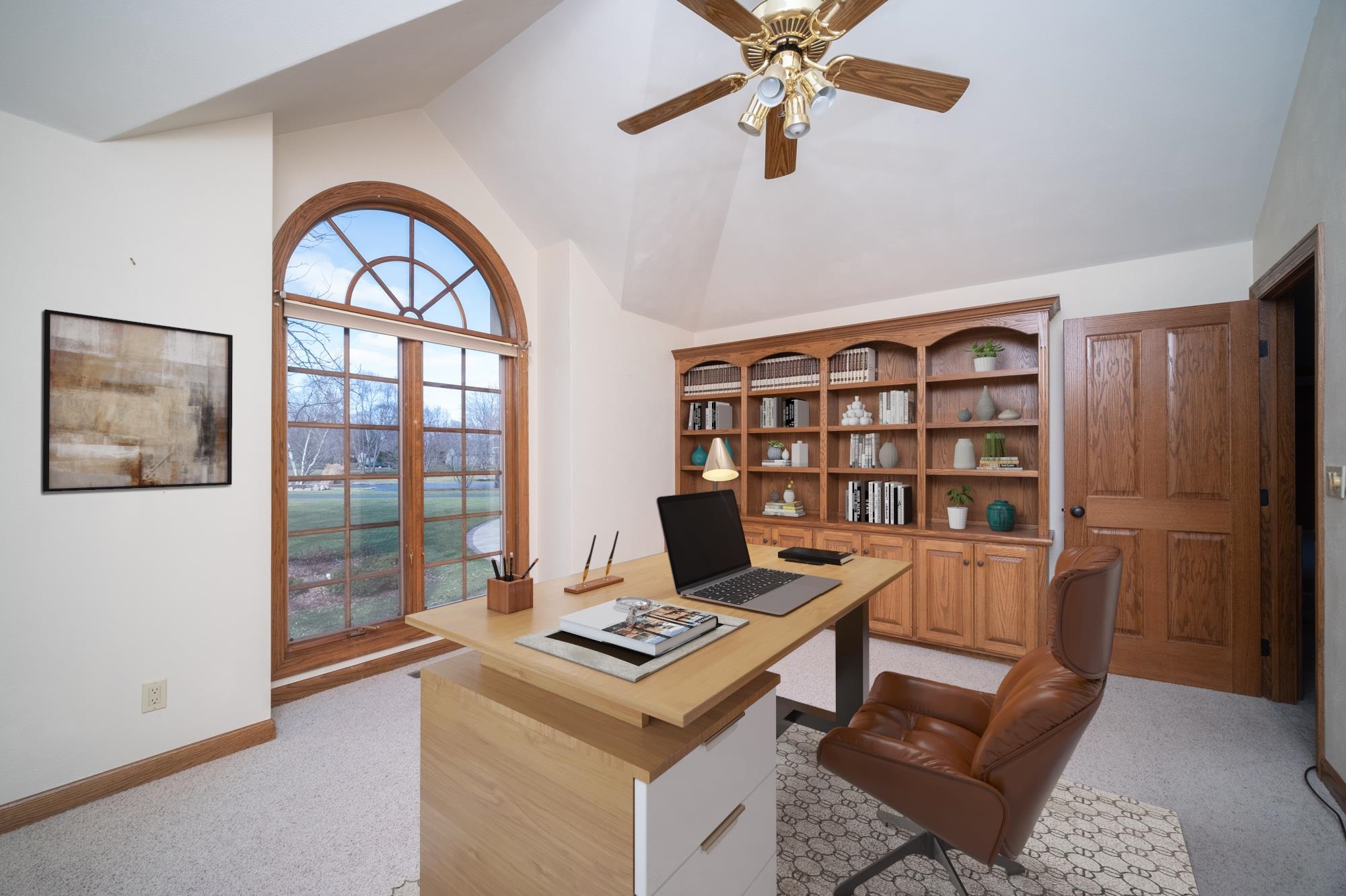 9805 Rivers Bend Drive Roscoe, IL 61073 - Photo 23 of 49 a view of a workspace with furniture and a window