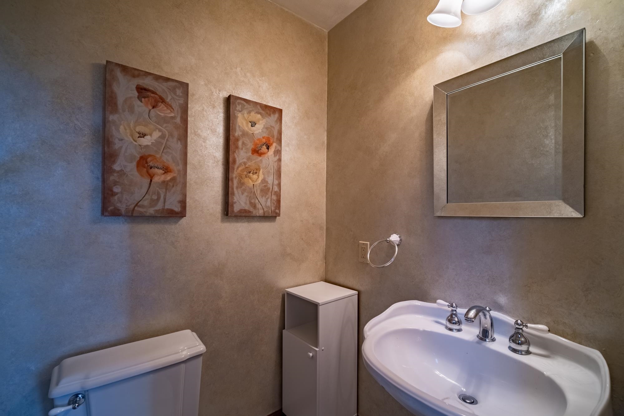 9805 Rivers Bend Drive Roscoe, IL 61073 - Photo 24 of 49 a bathroom with a toilet sink and mirror