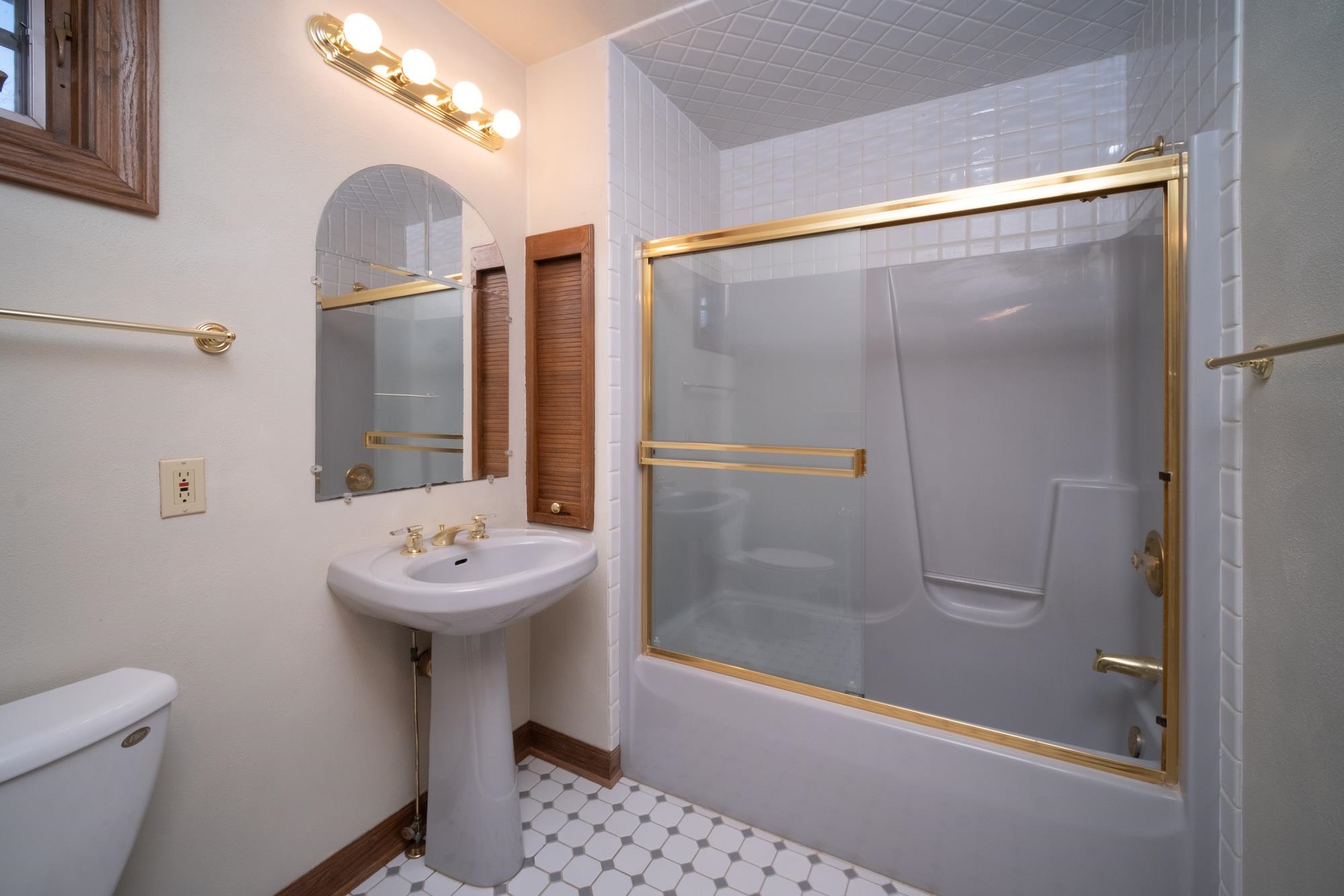 9805 Rivers Bend Drive Roscoe, IL 61073 - Photo 28 of 49 a bathroom with a sink mirror toilet and shower