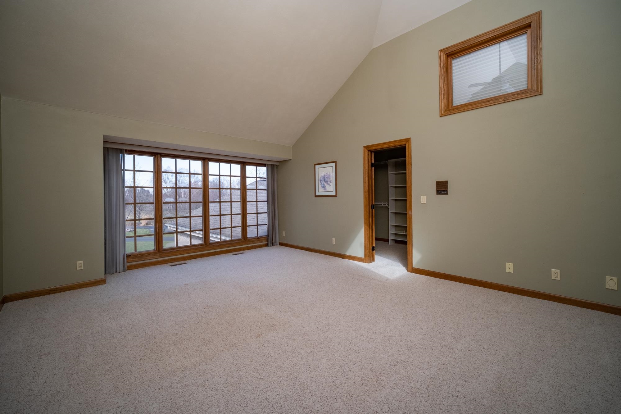 9805 Rivers Bend Drive Roscoe, IL 61073 - Photo 30 of 49 an empty room with windows