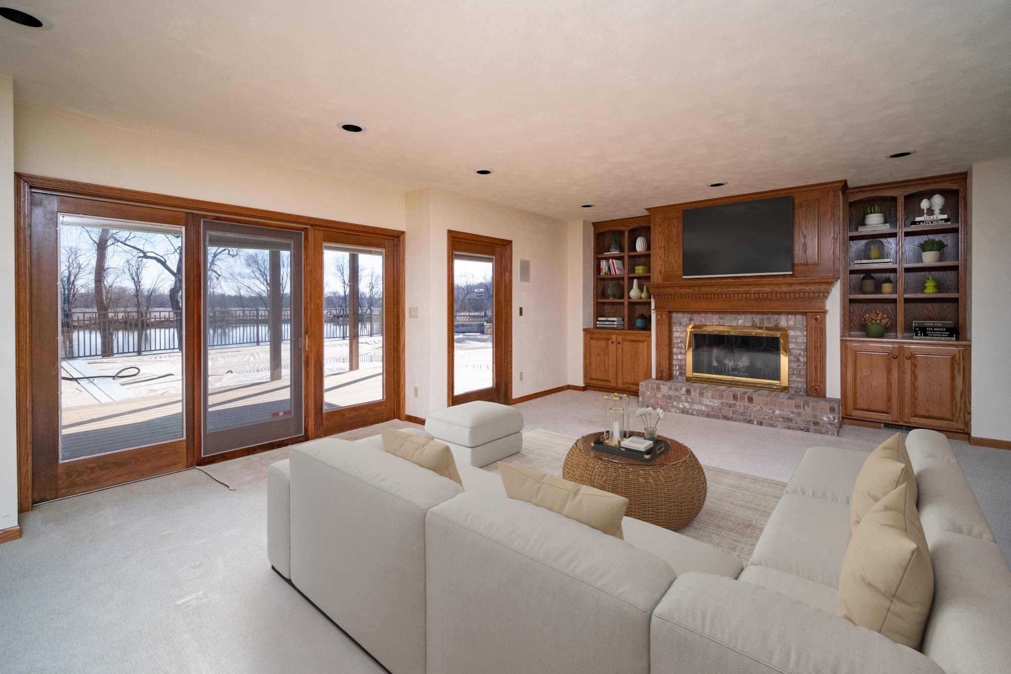 9805 Rivers Bend Drive Roscoe, IL 61073 - Photo 33 of 49 a living room with furniture large window and fireplace