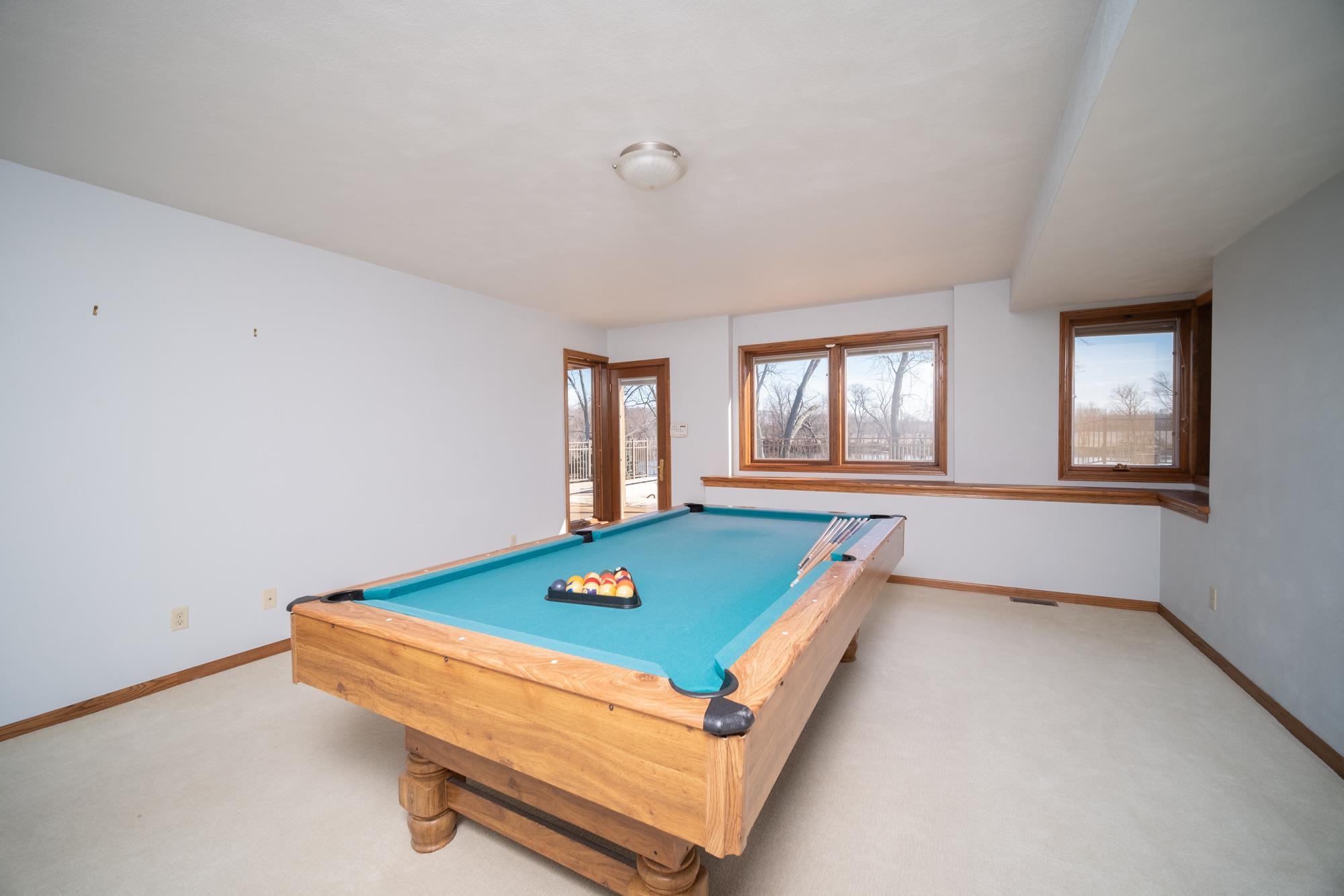 9805 Rivers Bend Drive Roscoe, IL 61073 - Photo 37 of 49 a room with pool table and windows