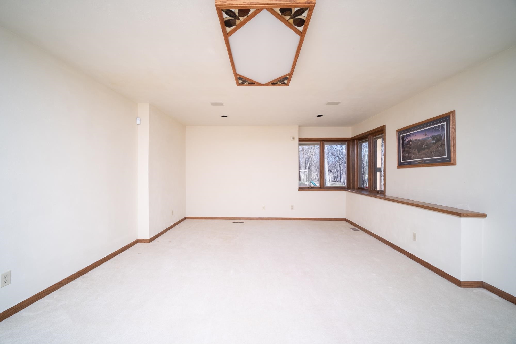 9805 Rivers Bend Drive Roscoe, IL 61073 - Photo 39 of 49 a view of an empty room with a window