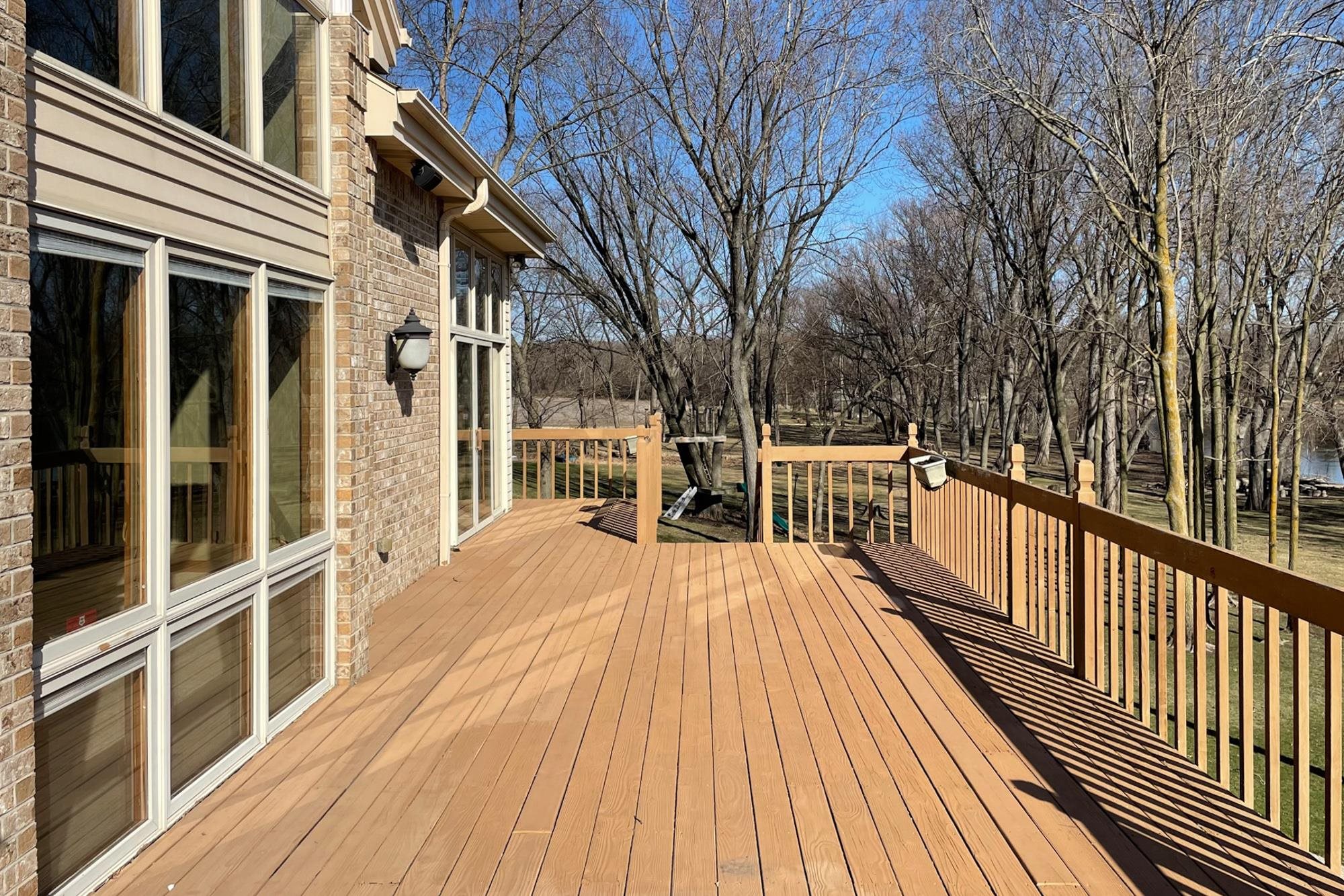 9805 Rivers Bend Drive Roscoe, IL 61073 - Photo 41 of 49 a view of a house with wooden deck