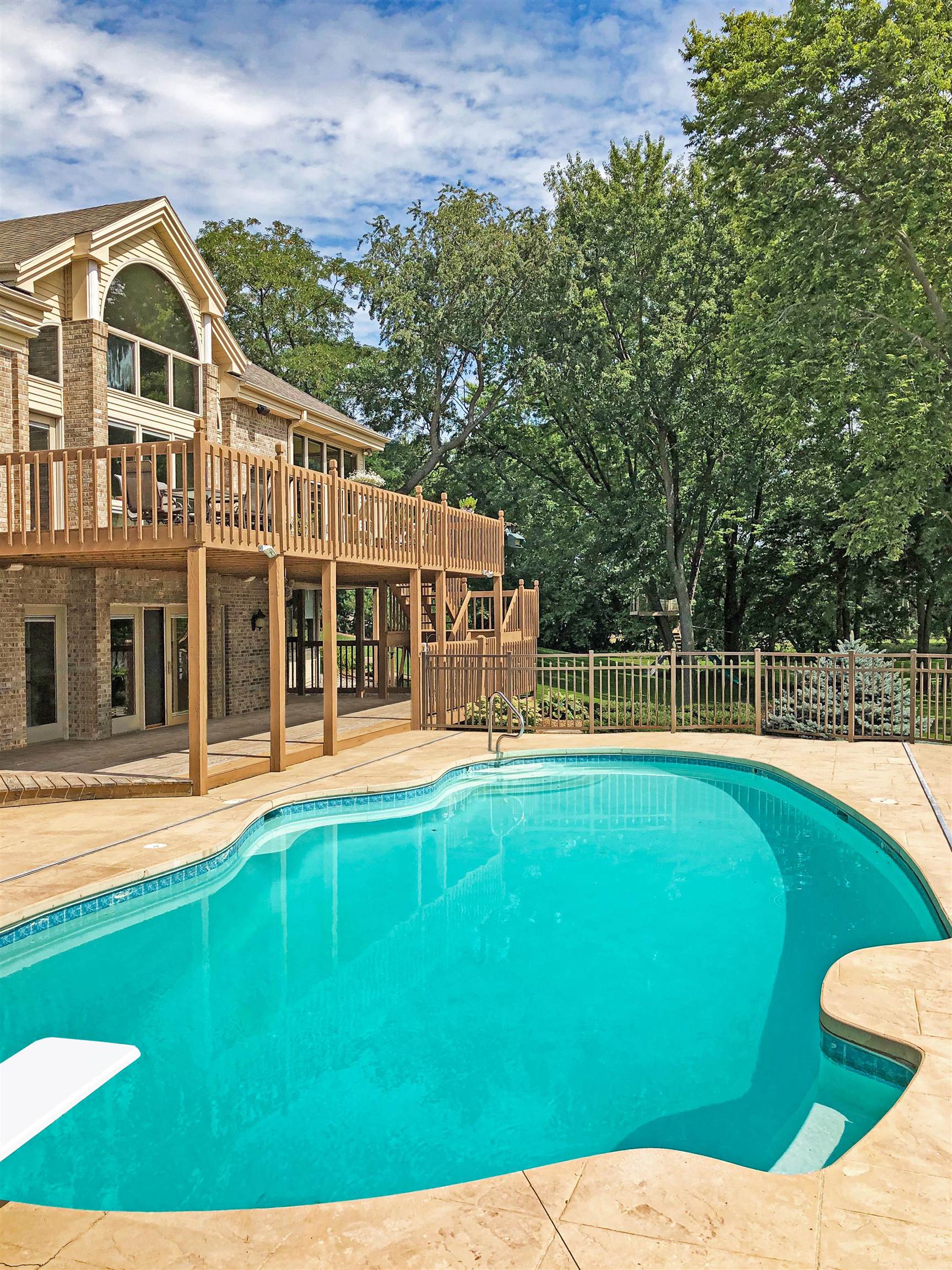 9805 Rivers Bend Drive Roscoe, IL 61073 - Photo 45 of 49 a view of a house with a swimming pool