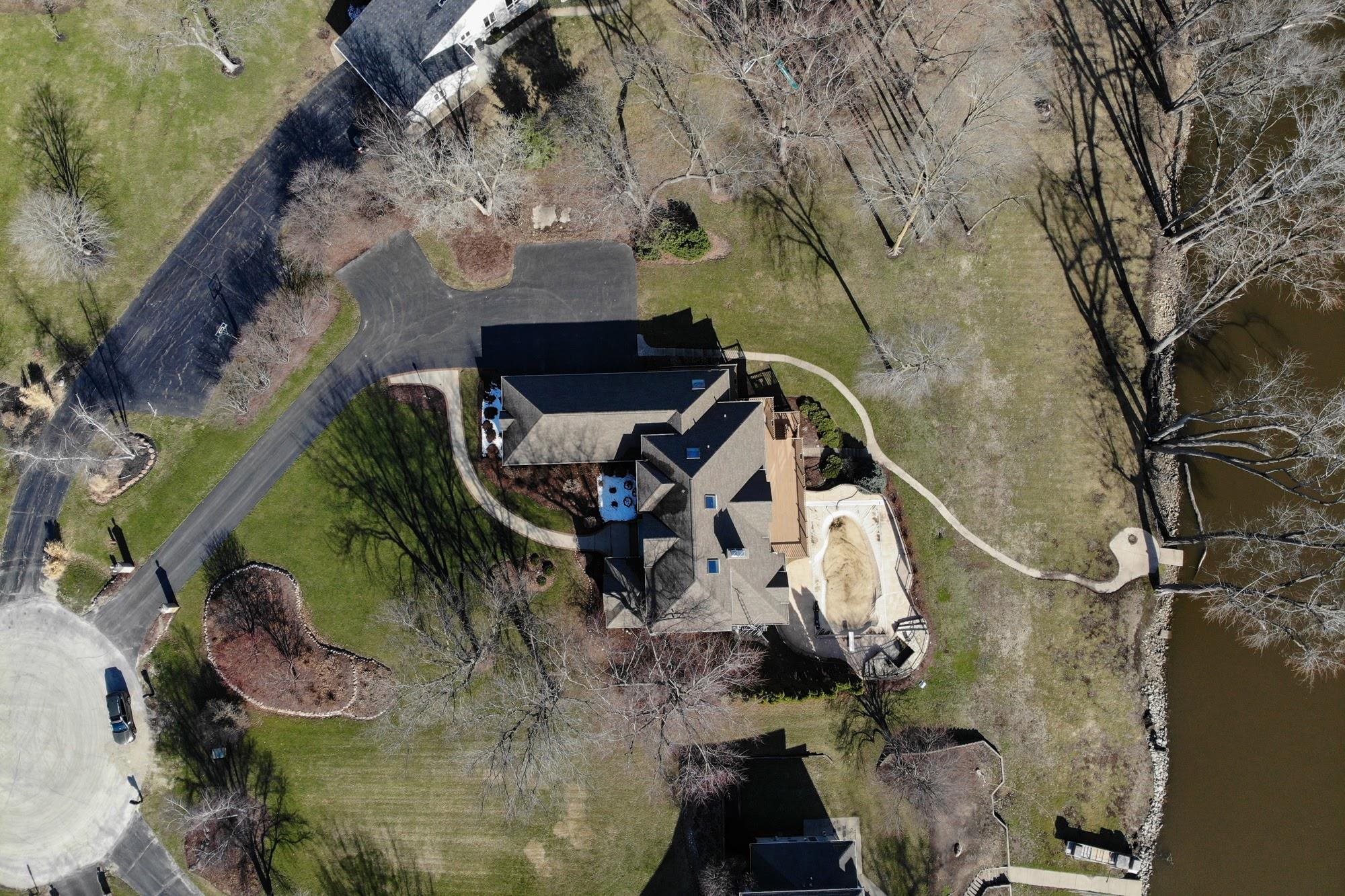9805 Rivers Bend Drive Roscoe, IL 61073 - Photo 48 of 49 an aerial view of a house with a yard