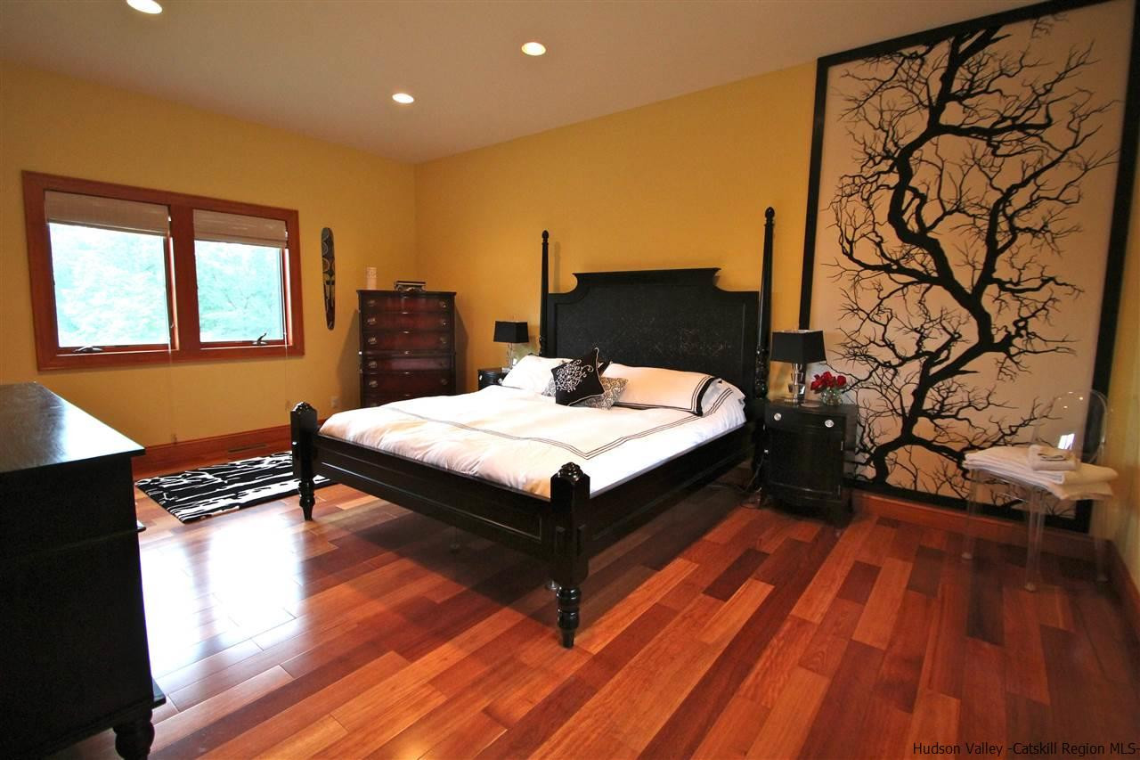 90 High Rocks Road Glenford, NY 12433 - Photo 12 of 34 a bed sitting in a room next to a window