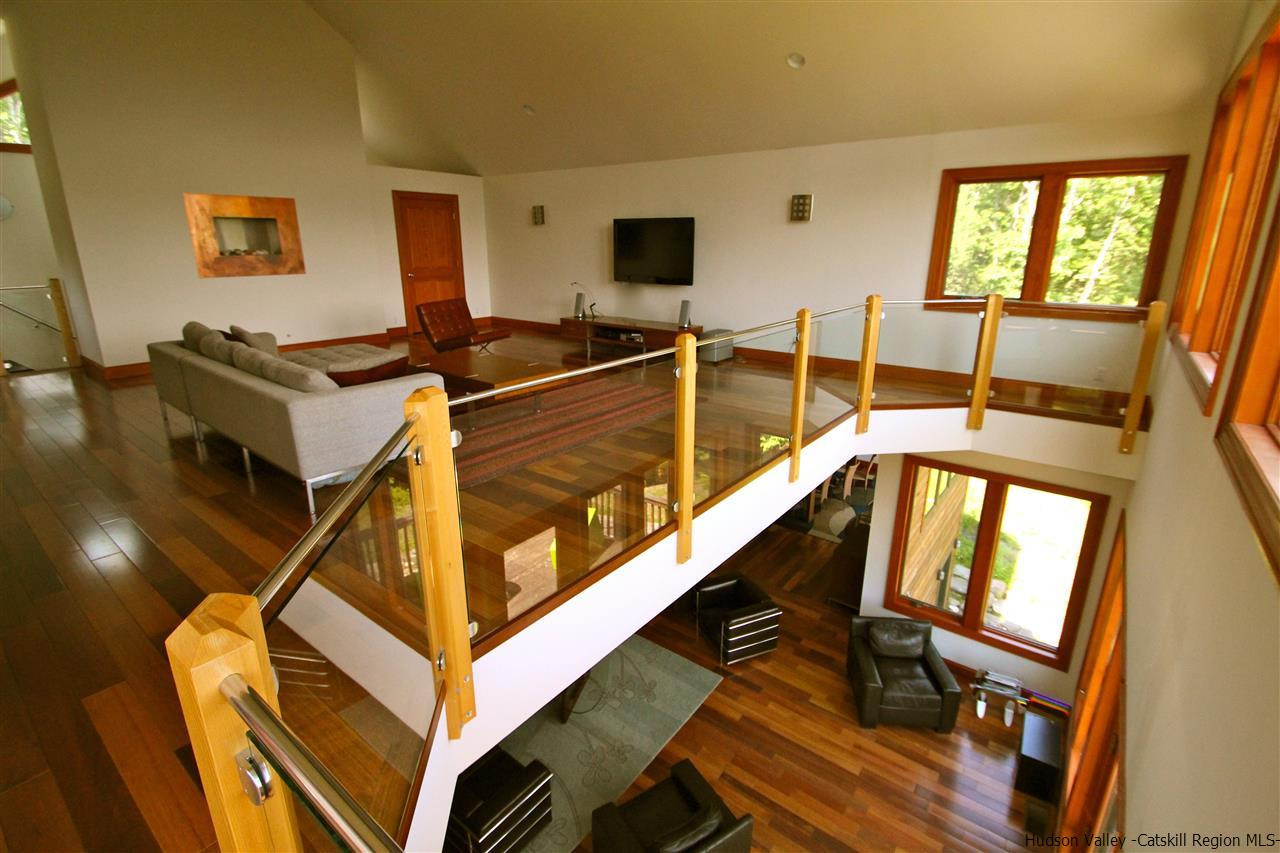 90 High Rocks Road Glenford, NY 12433 - Photo 18 of 34 a view of a living room with furniture and a flat screen tv