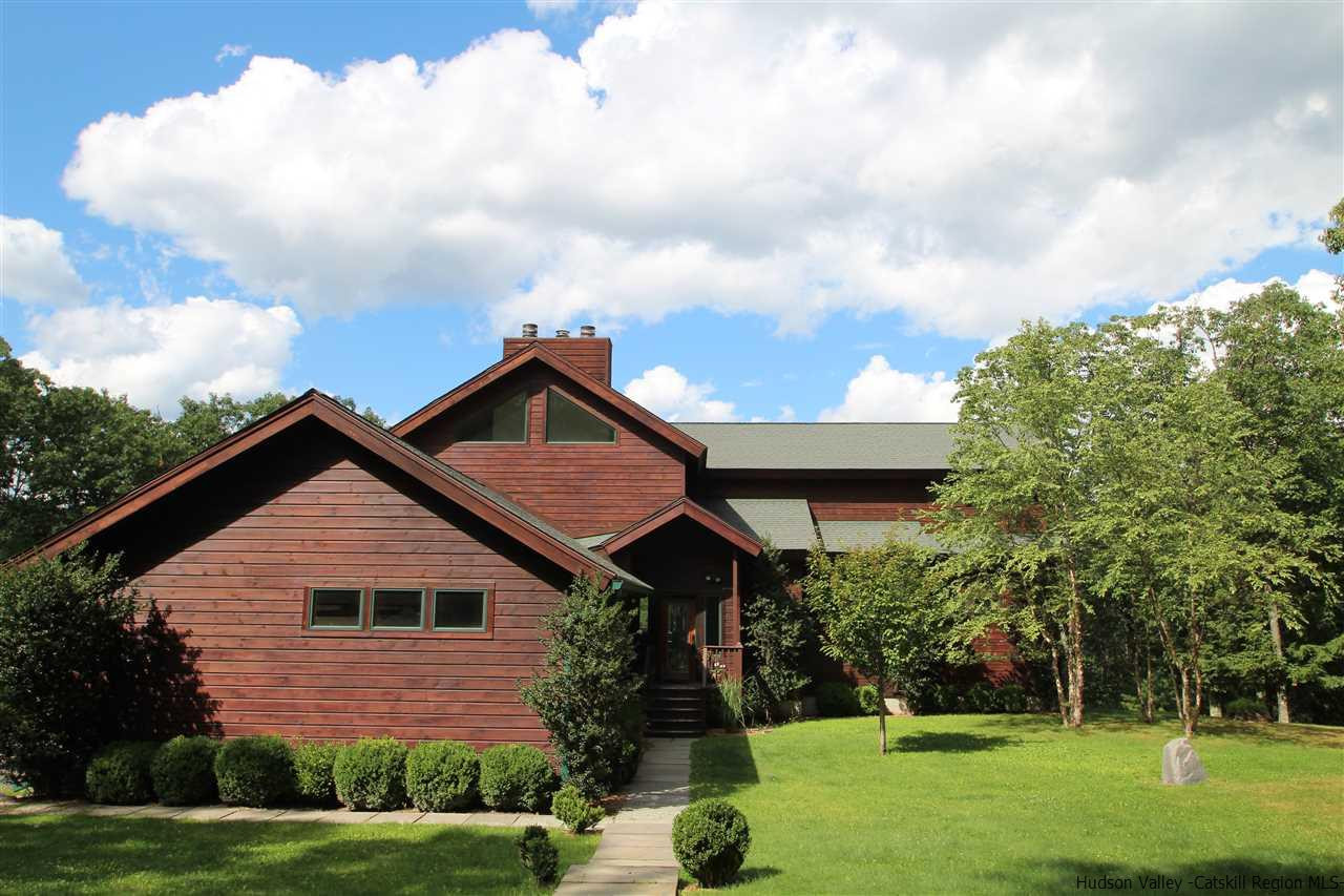 90 High Rocks Road Glenford, NY 12433 - Photo 2 of 34 a front view of a house with garden