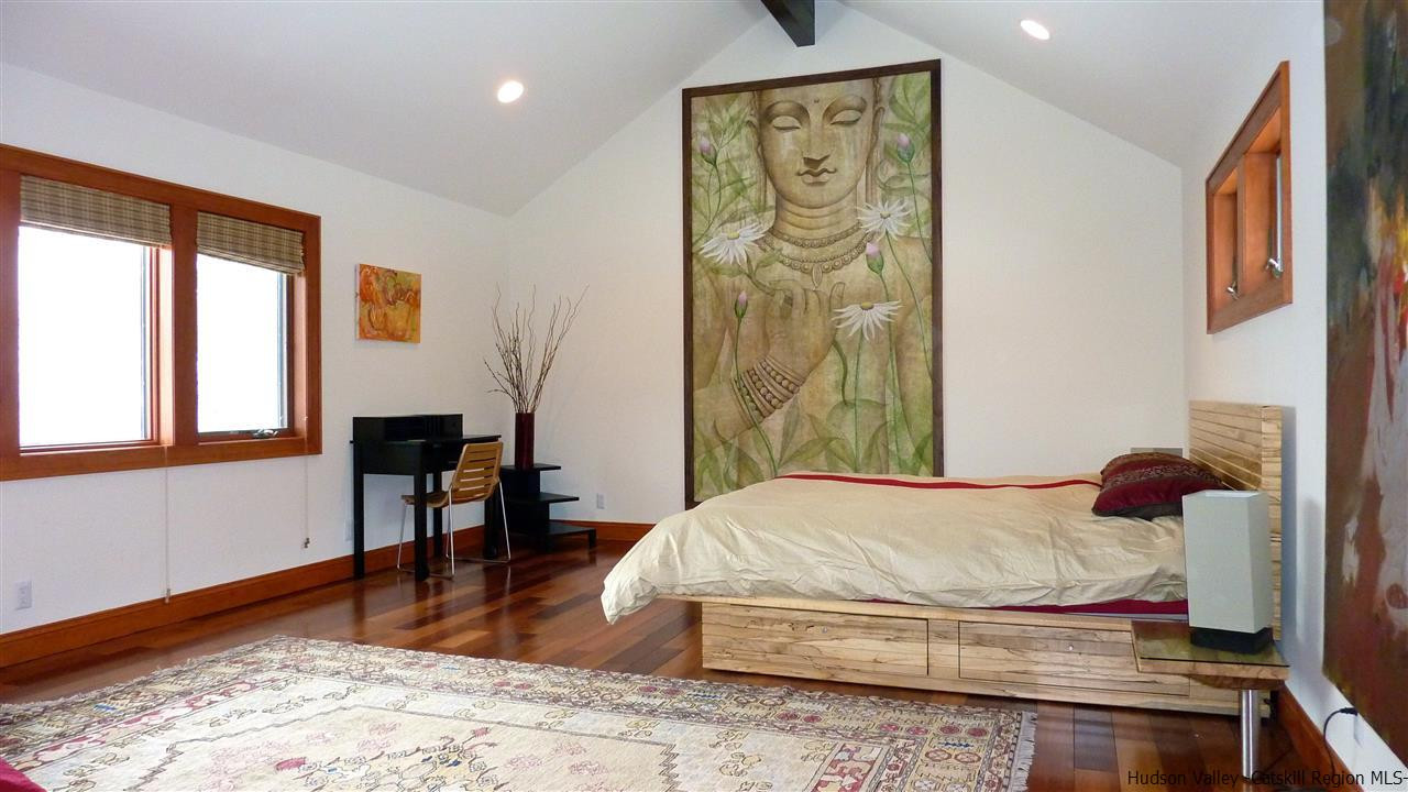 90 High Rocks Road Glenford, NY 12433 - Photo 21 of 34 a bedroom with a bed and wooden floor