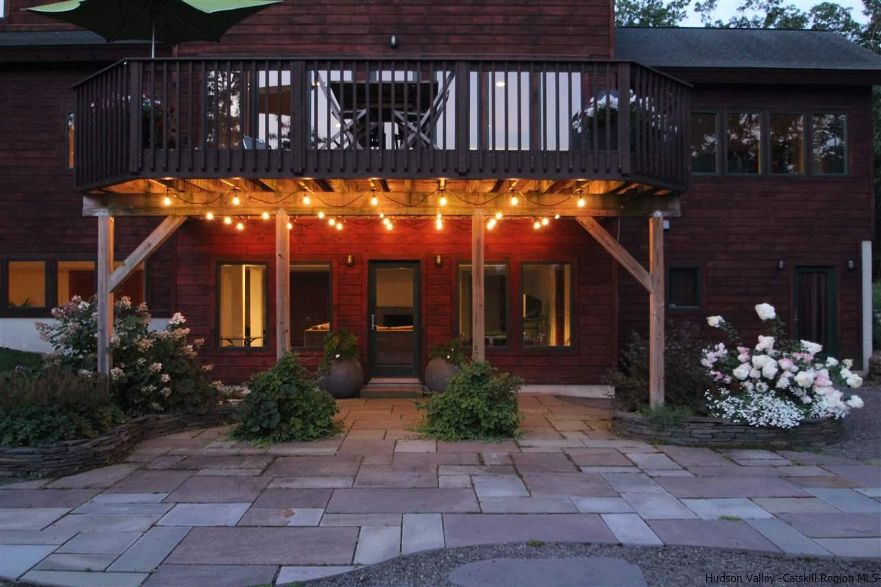90 High Rocks Road Glenford, NY 12433 - Photo 27 of 34 a view of a house with large windows and plants