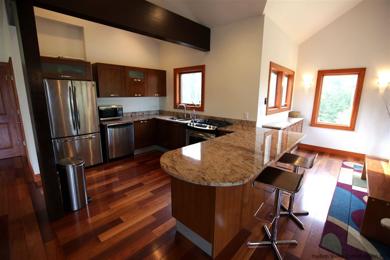 90 High Rocks Road Glenford, NY 12433 - Photo 29 of 34 a kitchen with dining table and chairs