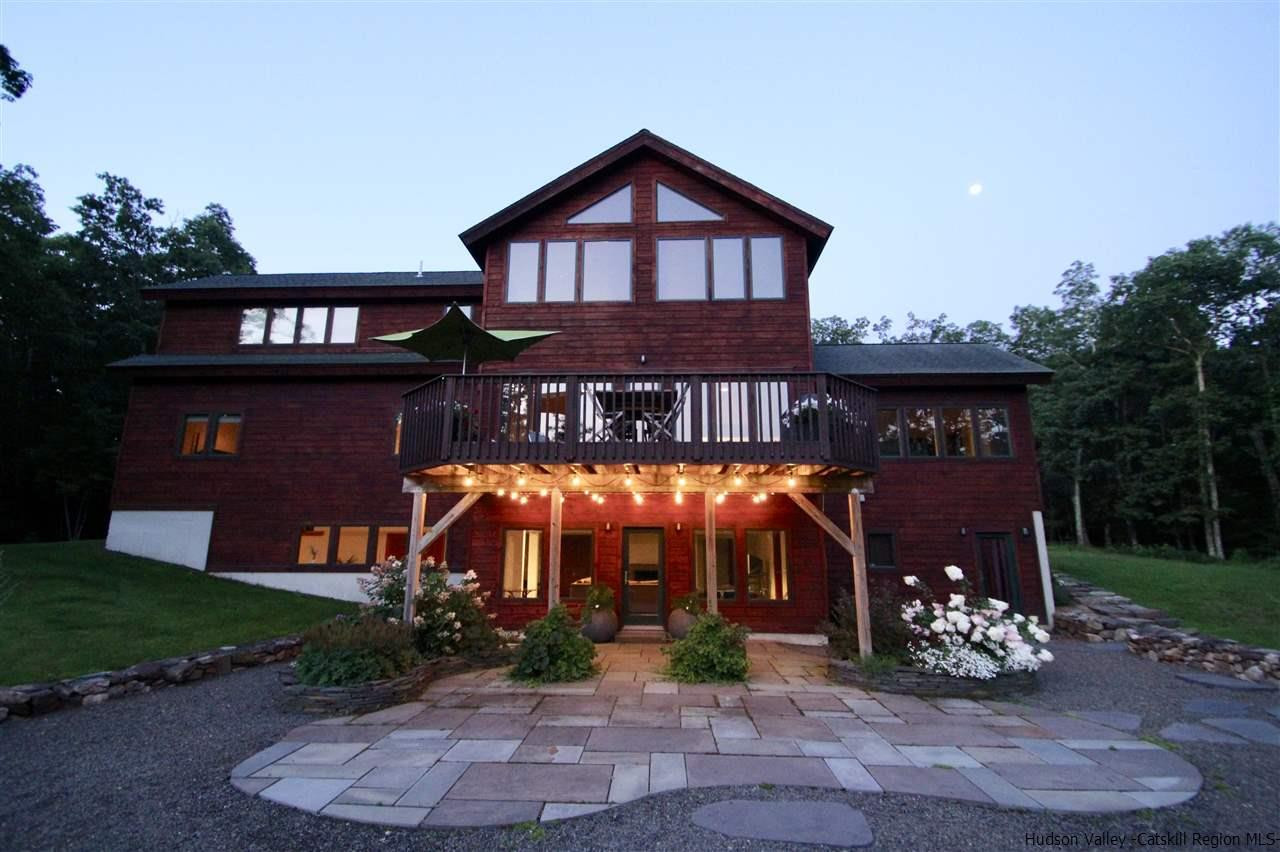 90 High Rocks Road Glenford, NY 12433 - Photo 3 of 34 a view of a brick house with a yard and plants