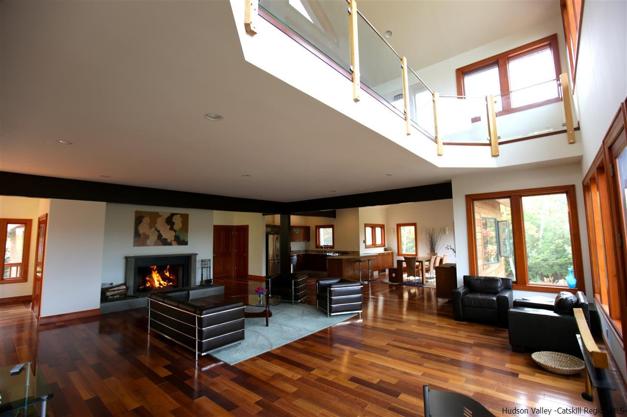 90 High Rocks Road Glenford, NY 12433 - Photo 6 of 34 a living room with furniture a wooden floor and a large window
