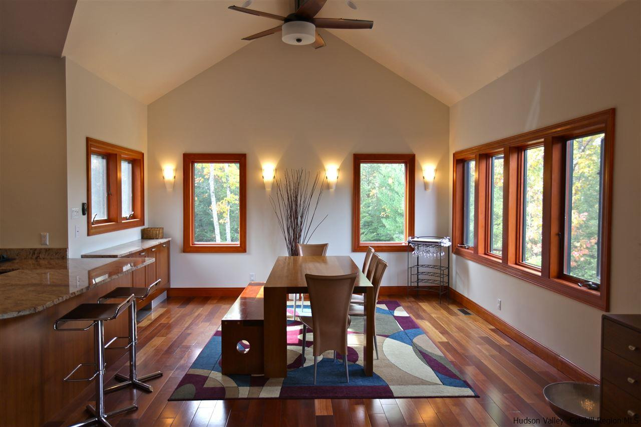 90 High Rocks Road Glenford, NY 12433 - Photo 10 of 34 a living room with furniture and floor to ceiling windows