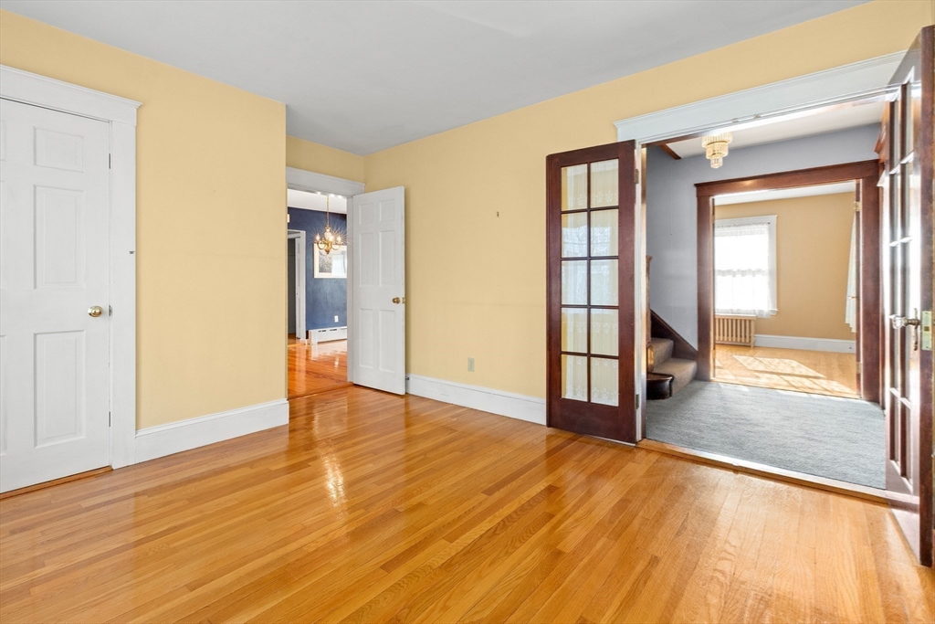 25 High Street Beverly, MA 01915 - Photo 17 of 42 a view of an empty room with glass door