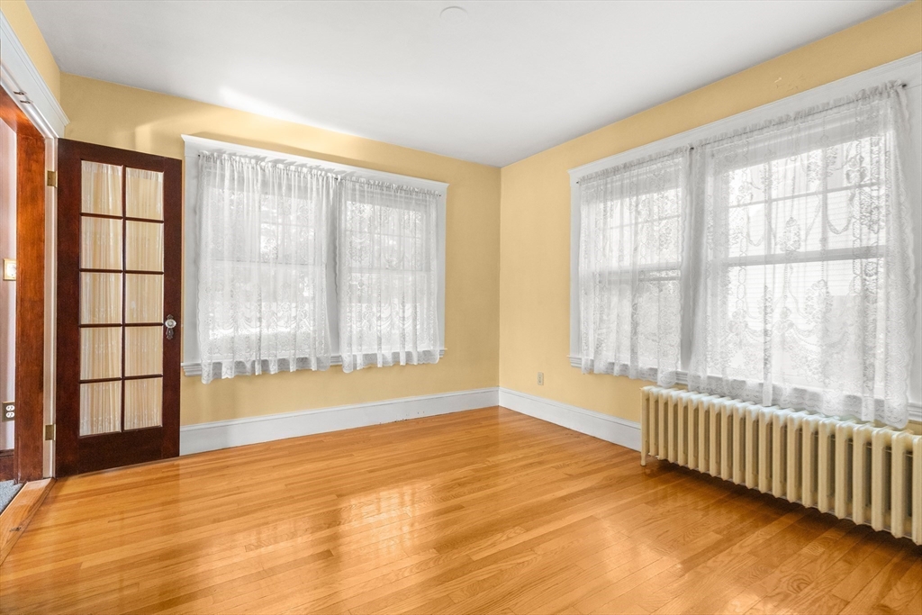 25 High Street Beverly, MA 01915 - Photo 18 of 42 a view of an empty room with a window
