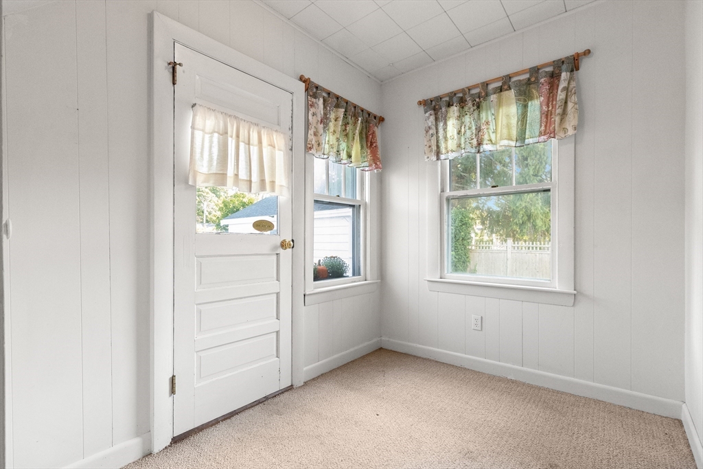 25 High Street Beverly, MA 01915 - Photo 19 of 42 an empty room with windows