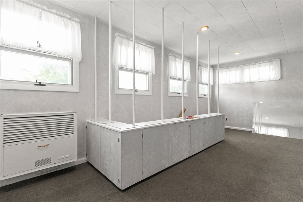 25 High Street Beverly, MA 01915 - Photo 34 of 42 a view of an empty room with a window