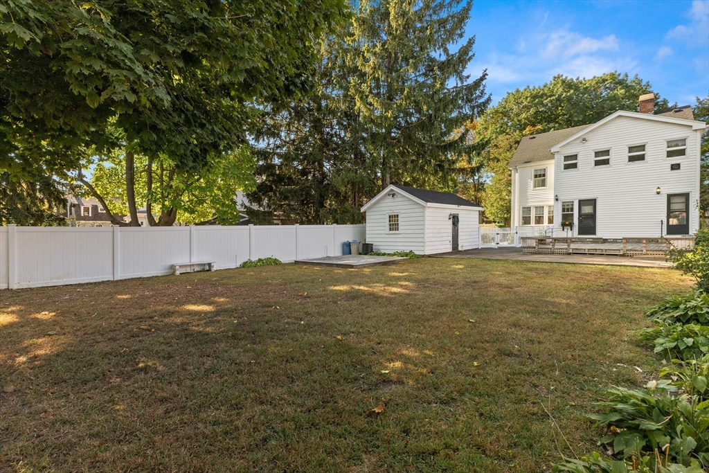 25 High Street Beverly, MA 01915 - Photo 41 of 42 a view of house with backyard and tree