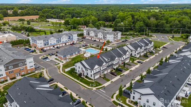 an aerial view of a house with a garden