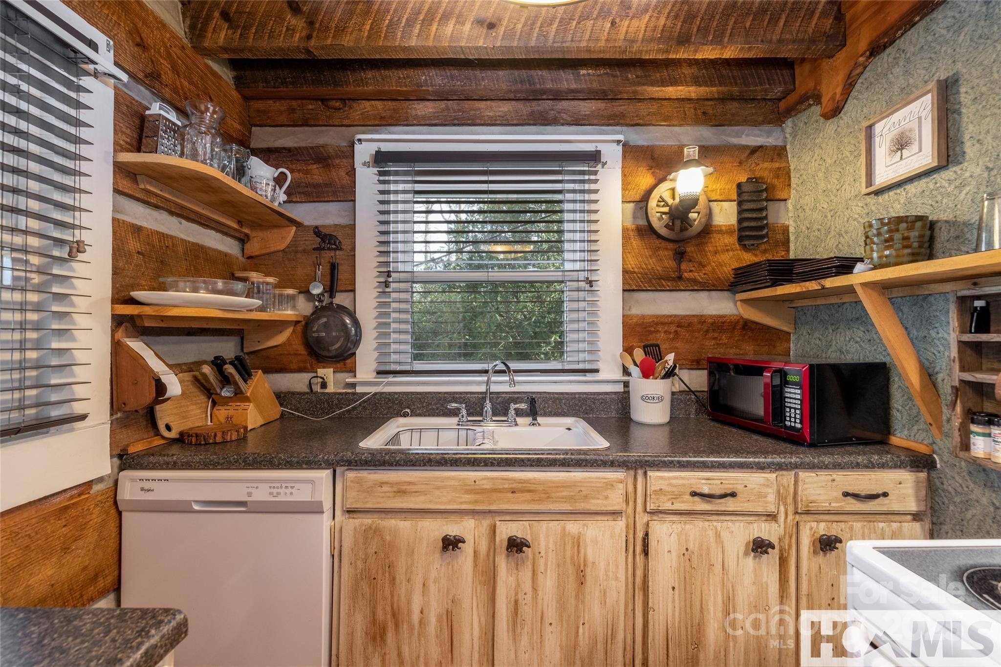 1524 McCall Road Cashiers, NC 28717 - Photo 12 of 35 a kitchen with sink and window