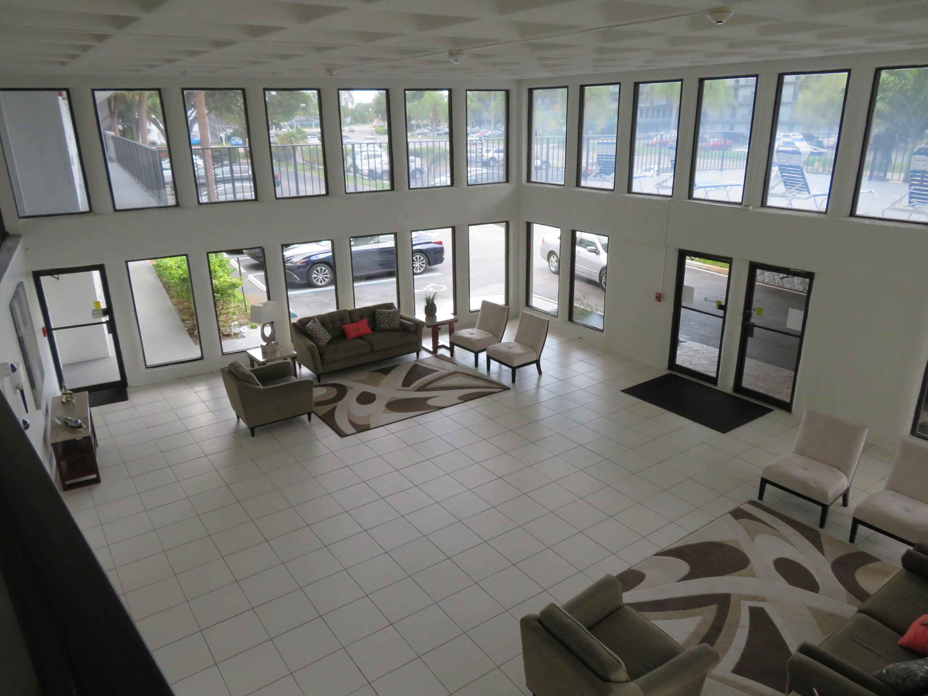 9233 Southwest 8th Street, Unit 207 Boca Raton, FL 33428 - Photo 13 of 42 22_9233_Bldg._Lobby