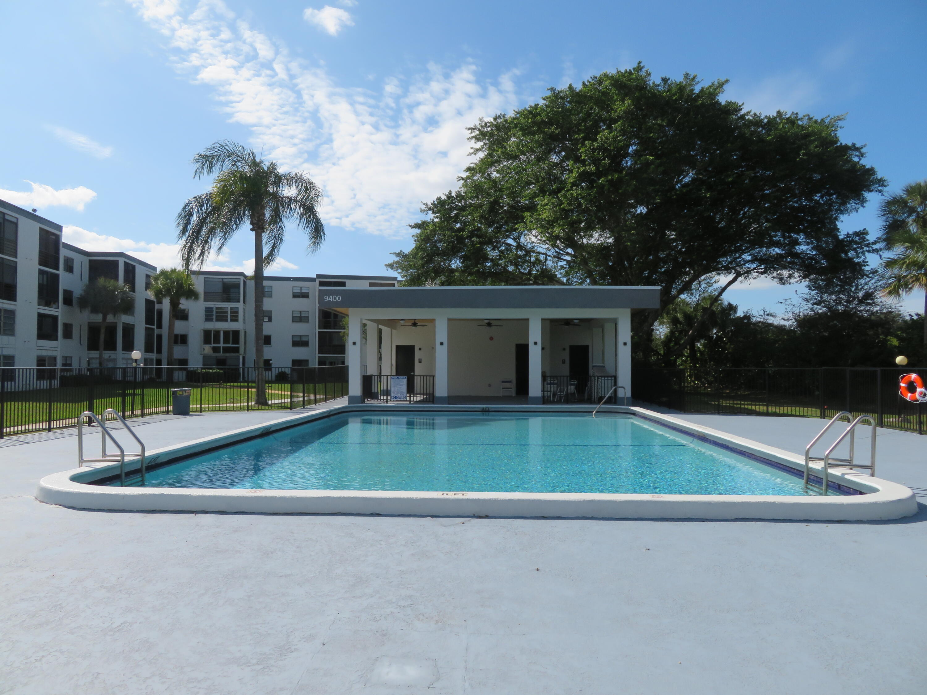 9233 Southwest 8th Street, Unit 207 Boca Raton, FL 33428 - Photo 19 of 42 35_9233_Bldg._Pool