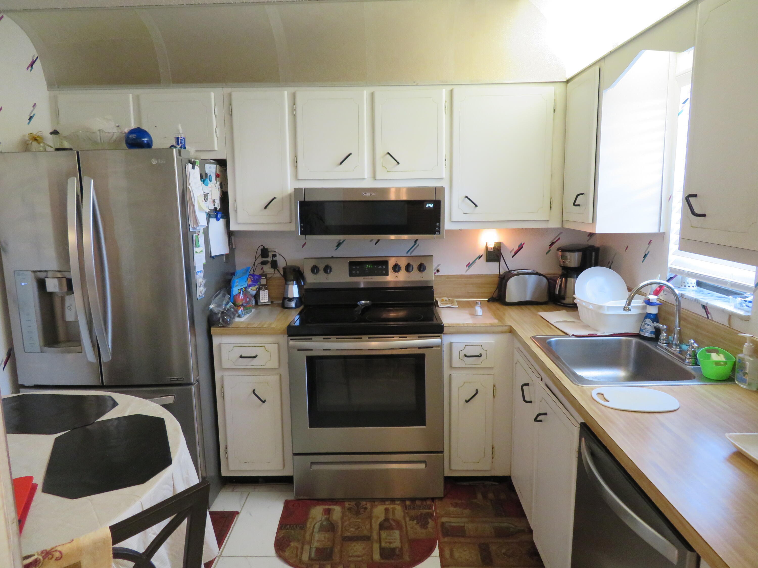 9233 Southwest 8th Street, Unit 207 Boca Raton, FL 33428 - Photo 23 of 42 42 9233-207 Kitchen
