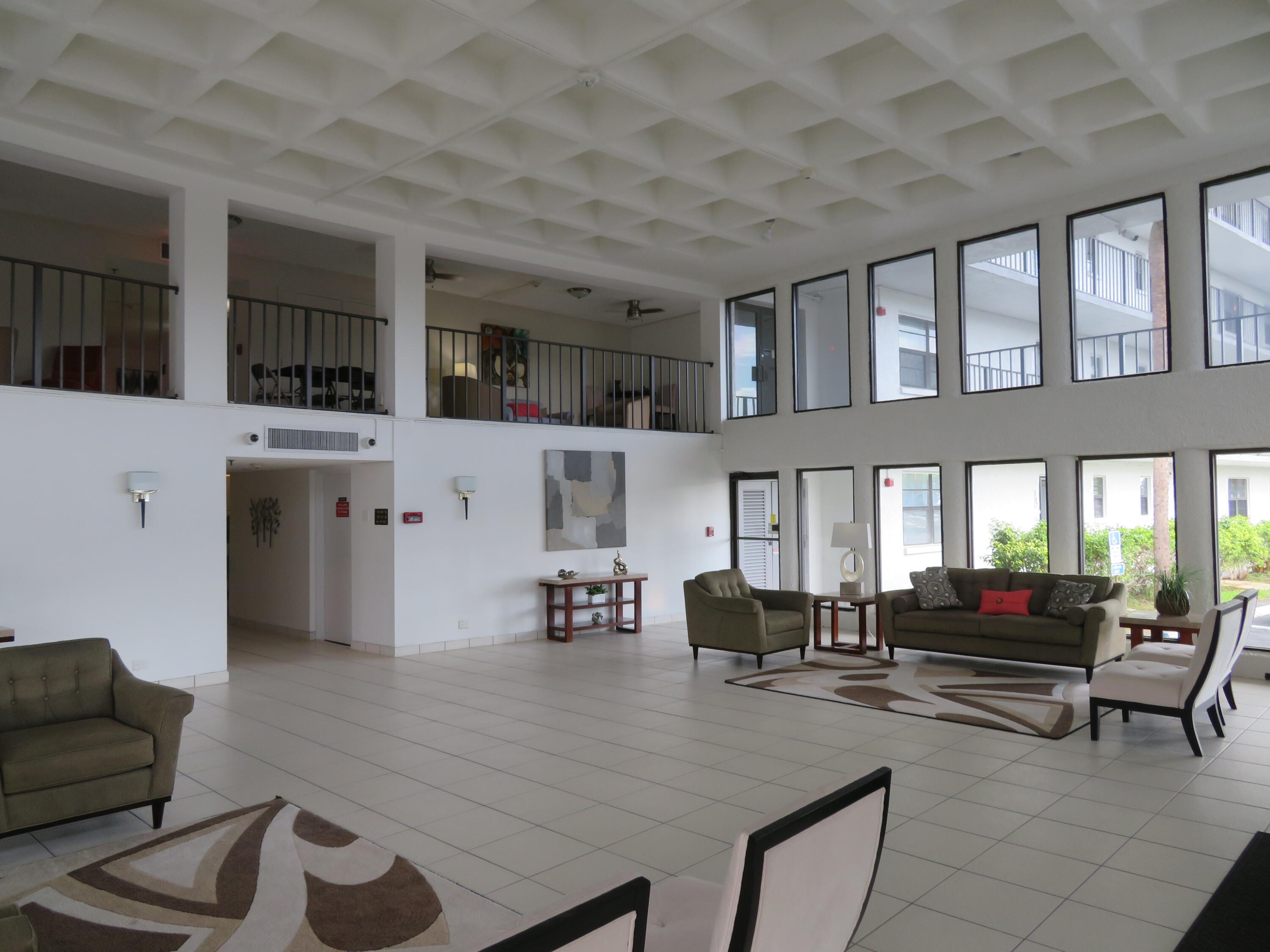 9233 Southwest 8th Street, Unit 207 Boca Raton, FL 33428 - Photo 9 of 42 14_9233_Bldg._Lobby